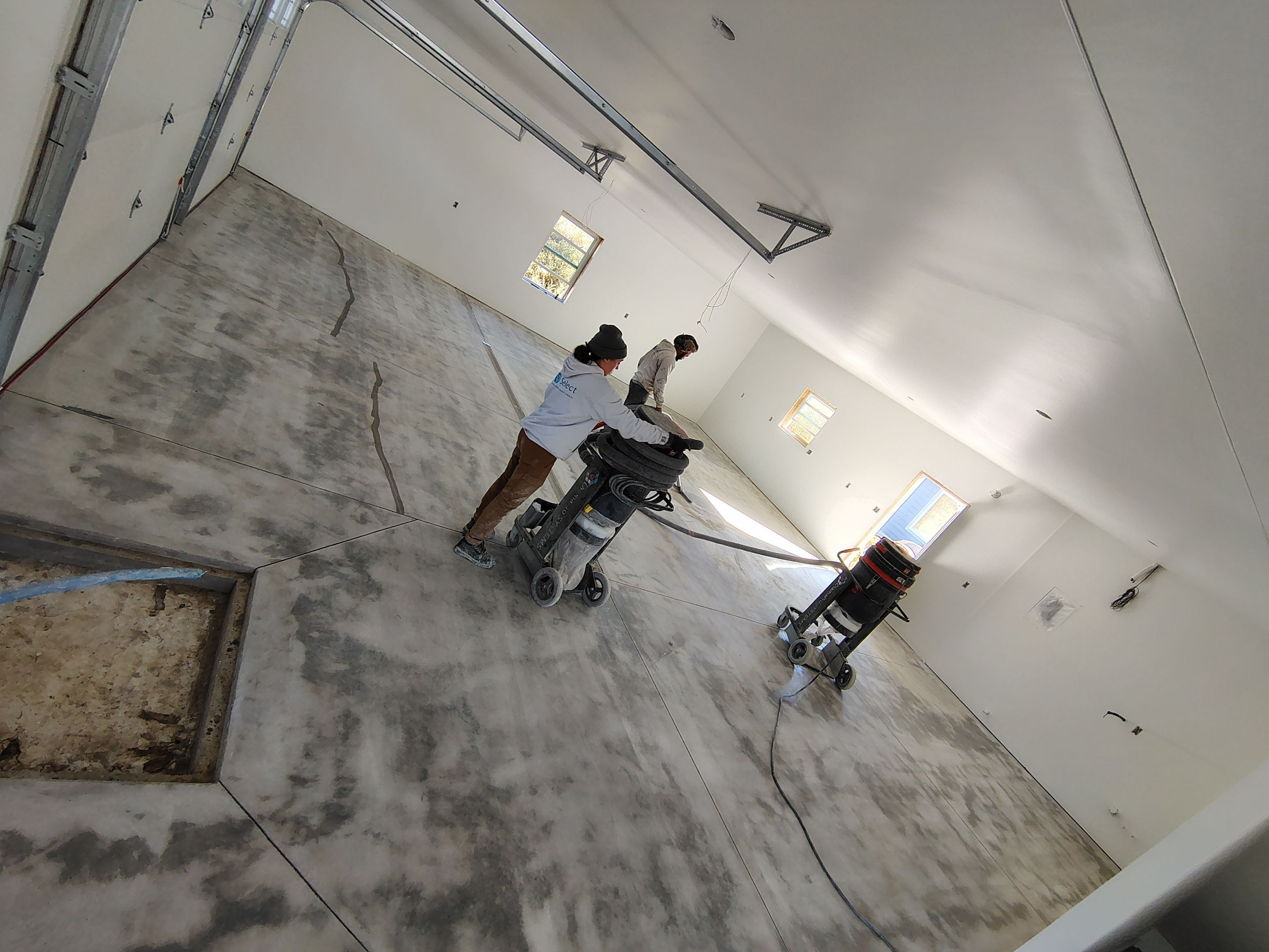 Custom Garage and Basement Epoxy Floor Coating in Menno by Select Painting, Coatings & Garage Cabinets