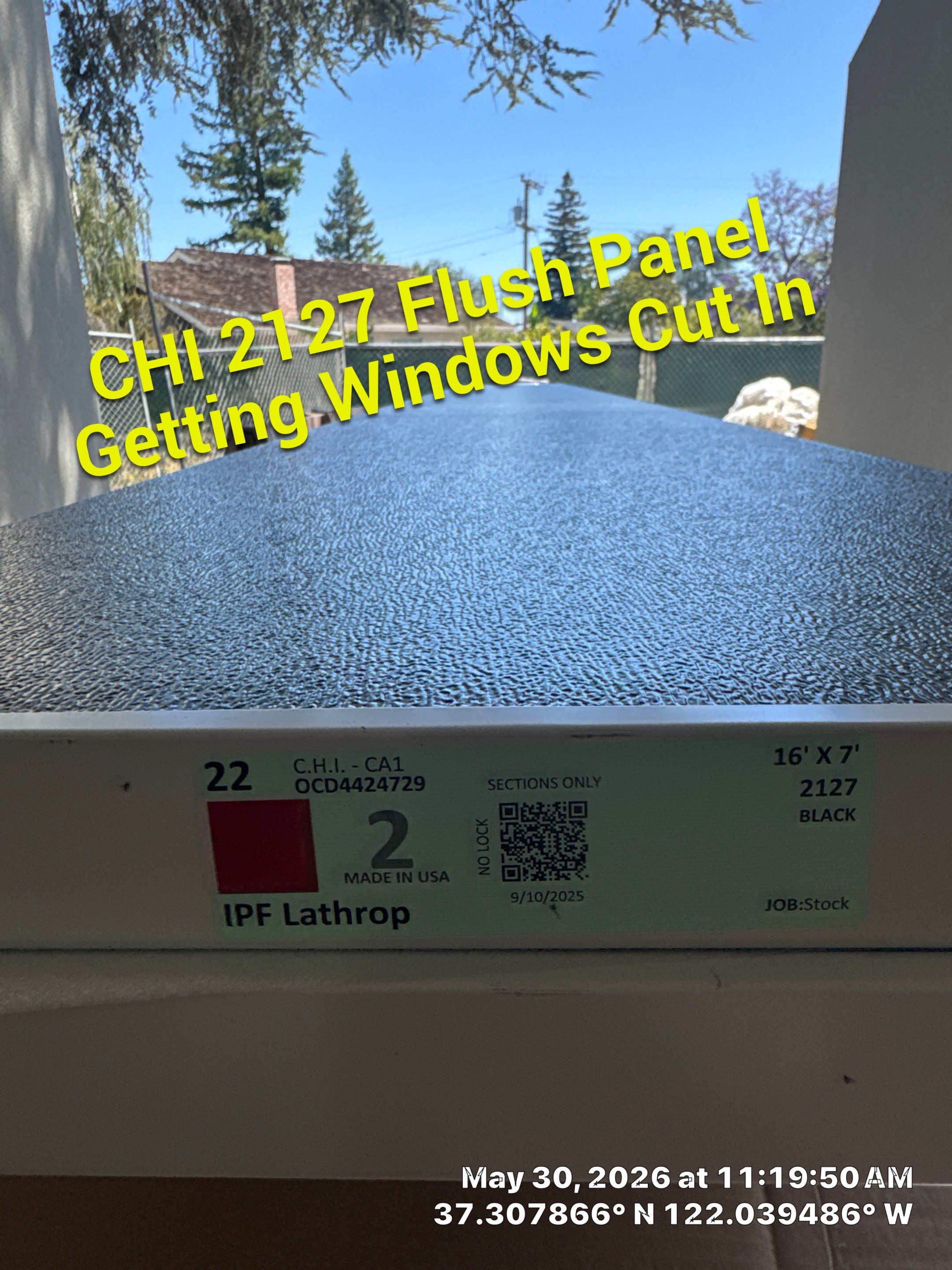 Modern Black Garage Door Installation With Vertical Windows In Cupertino by Valiant Garage Door