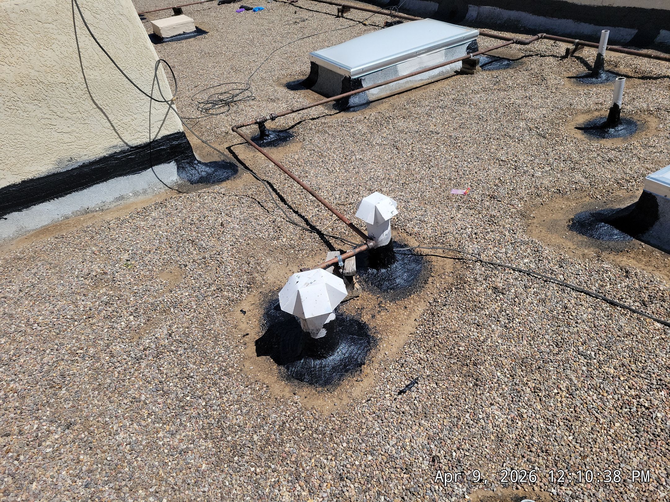 Tar and Gravel Roof Maintenance and Skylight Sealing in Rio Rancho by Doyle Roof Masters Inc