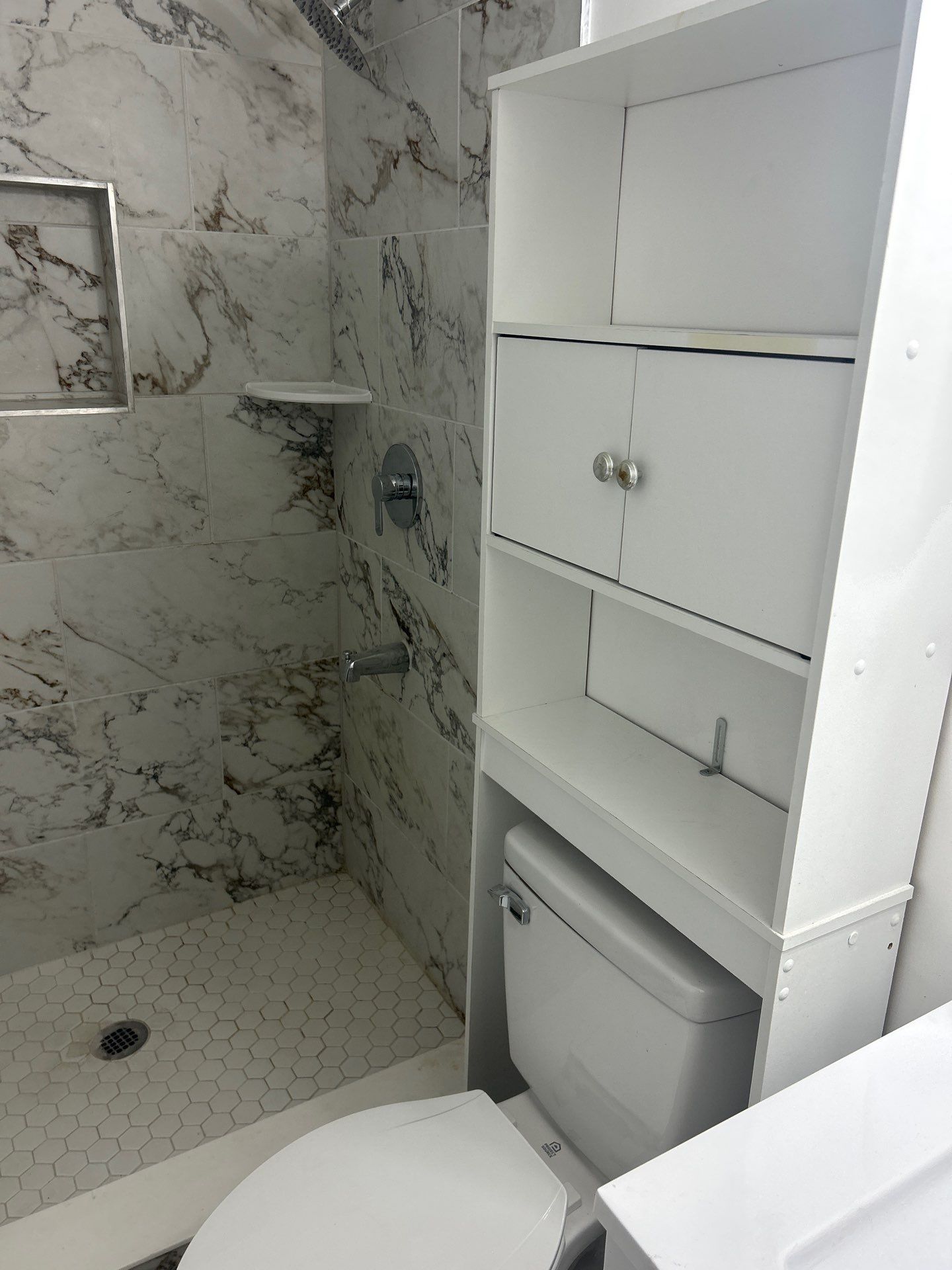 Dual Bathroom Makeover by urban green energy llc