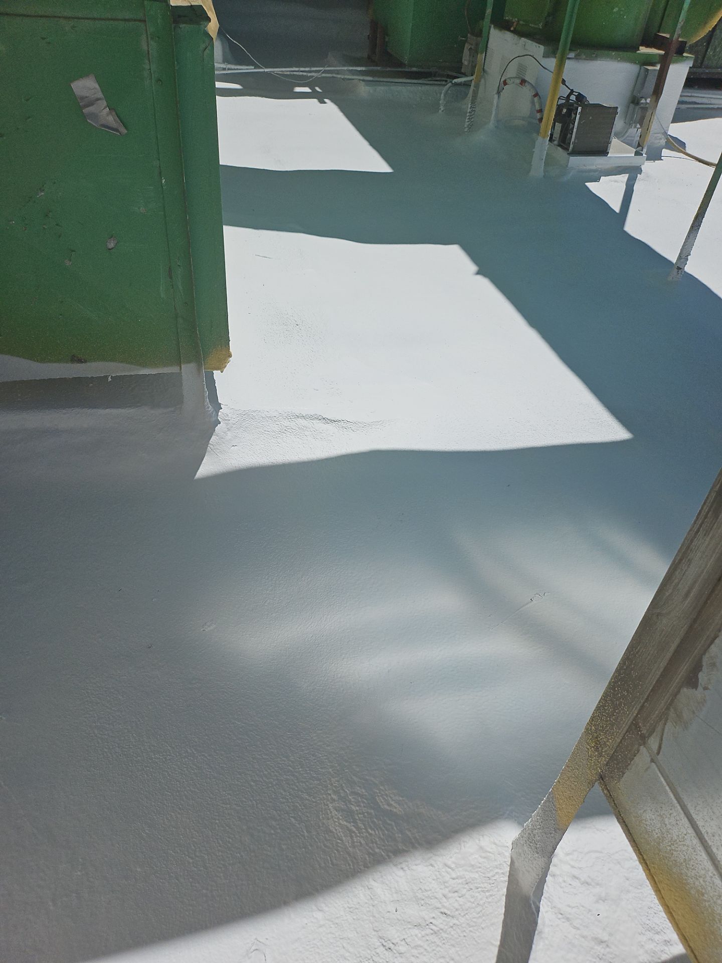 Spray foam and coatings using General Coatings acrylic coatings and spray foam by Straight Edge Roofing Inc