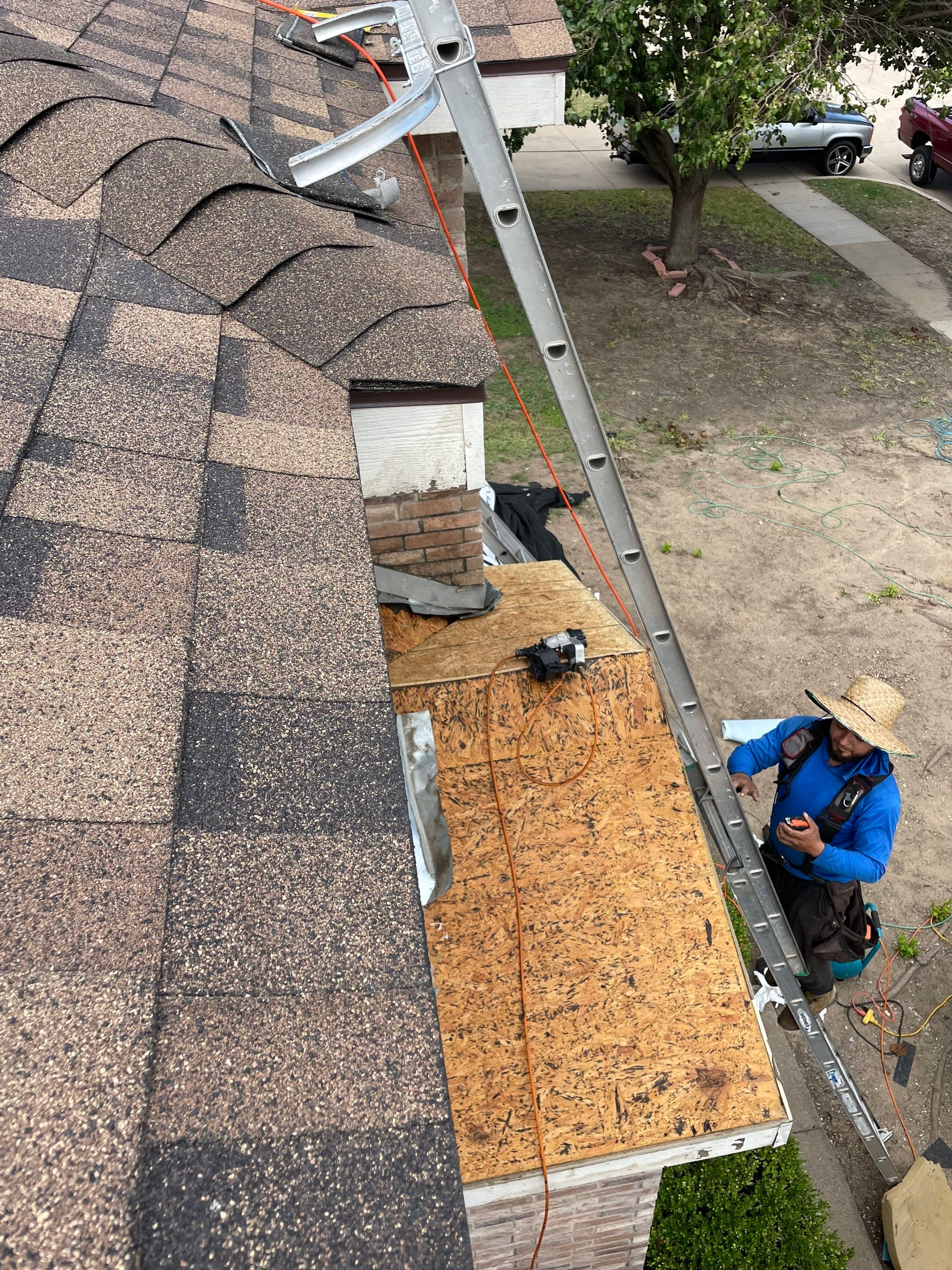Full Roof Replacement, Chimney Rebuild and Interior Damage Replacement by First United Roofing & Construction