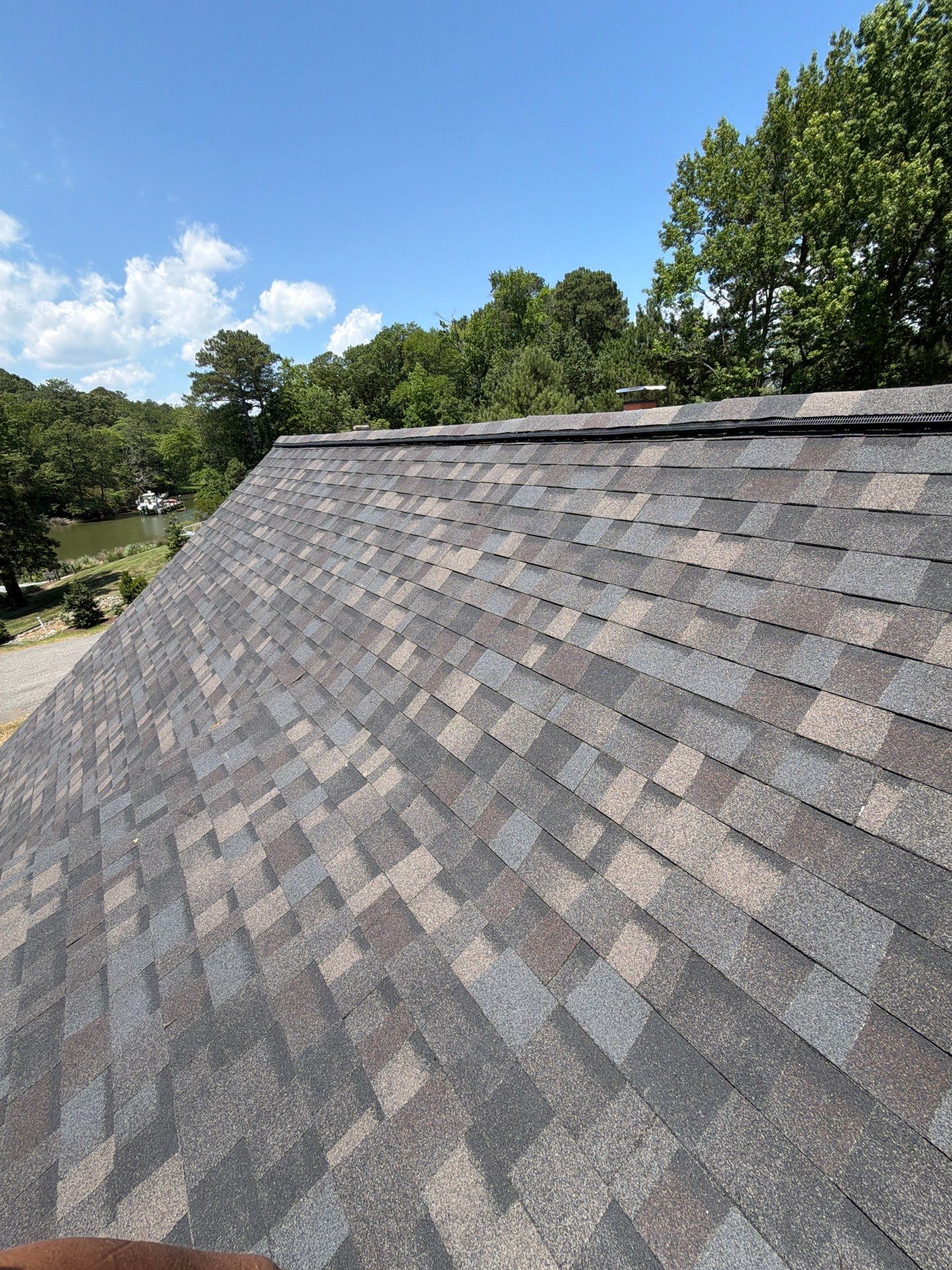 Complete Asphalt Shingle Roof Replacement and Sheathing Repair in Deltaville by Cade Construction