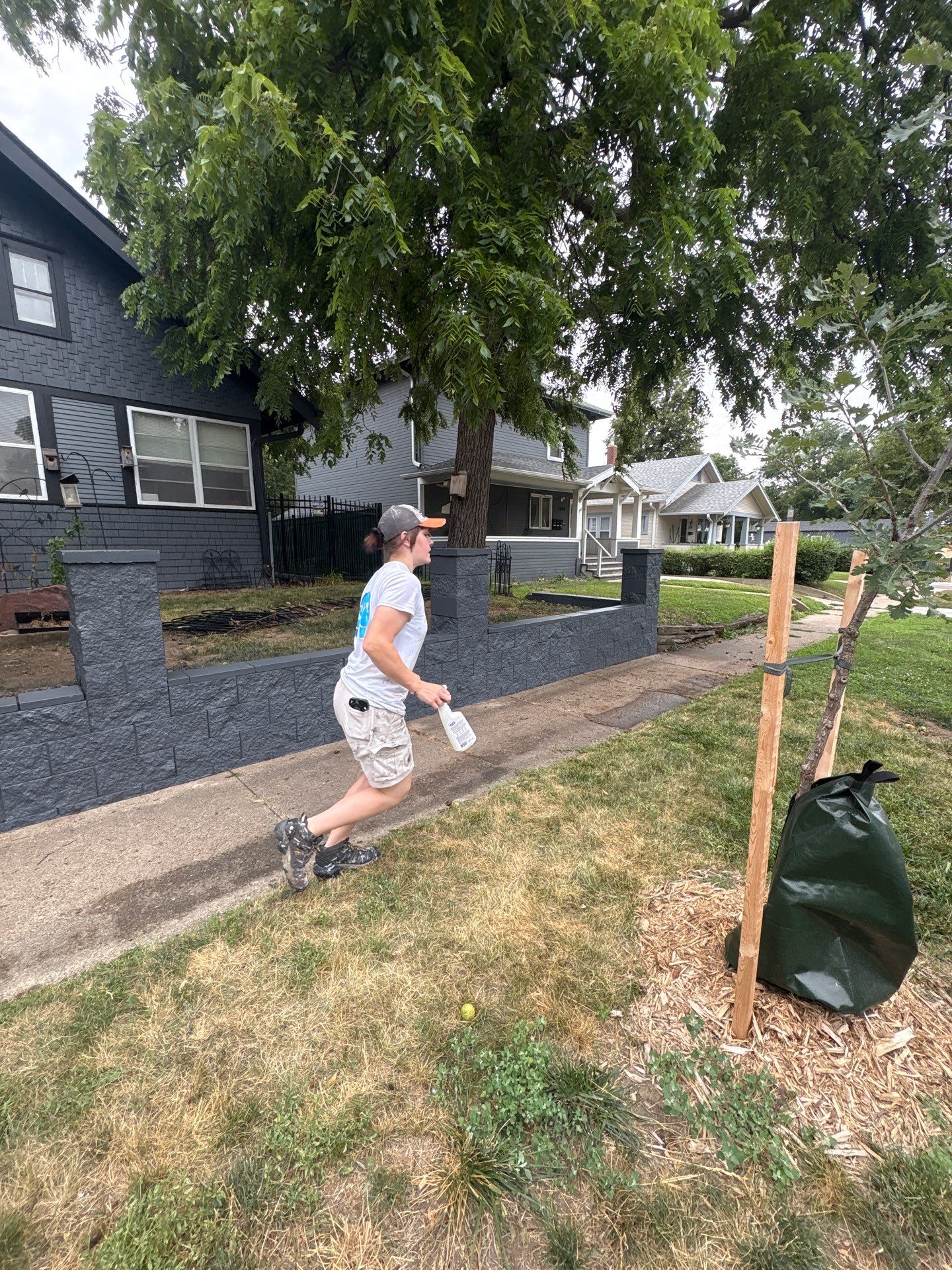 Exterior Masonry Painting for a Sioux Falls Retaining Wall by Select Painting, Coatings & Garage Cabinets