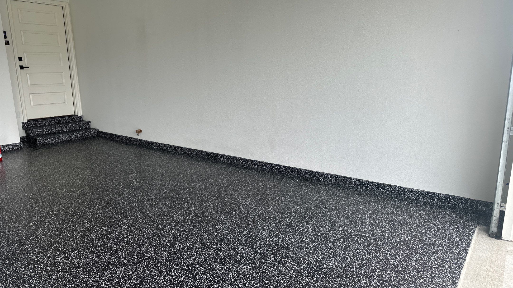 John H. received his dream garage with cabinets and a Banner Garage Floor by Banner Garage