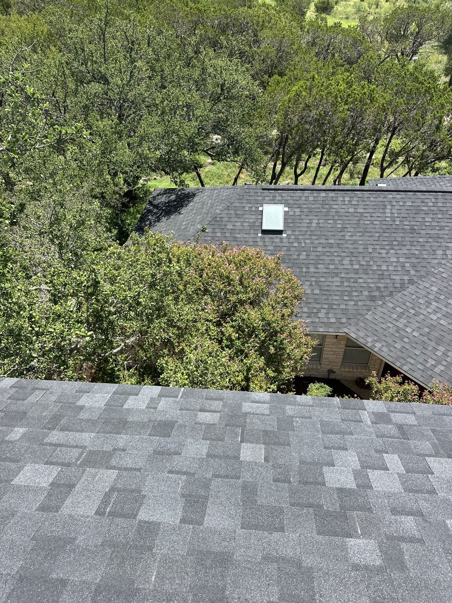 Residential Roofing Installation using IKO Nordic Granite Black by DeZign Roofing & Exteriors