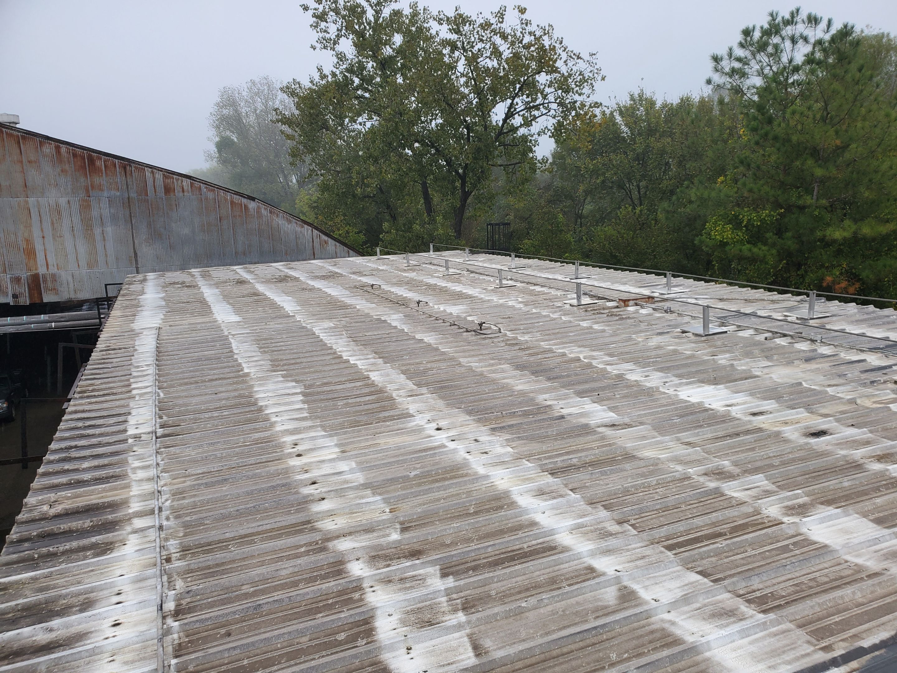 Commercial Roofing Installation using Aluminum Roofing panels by Hostetler Roofing