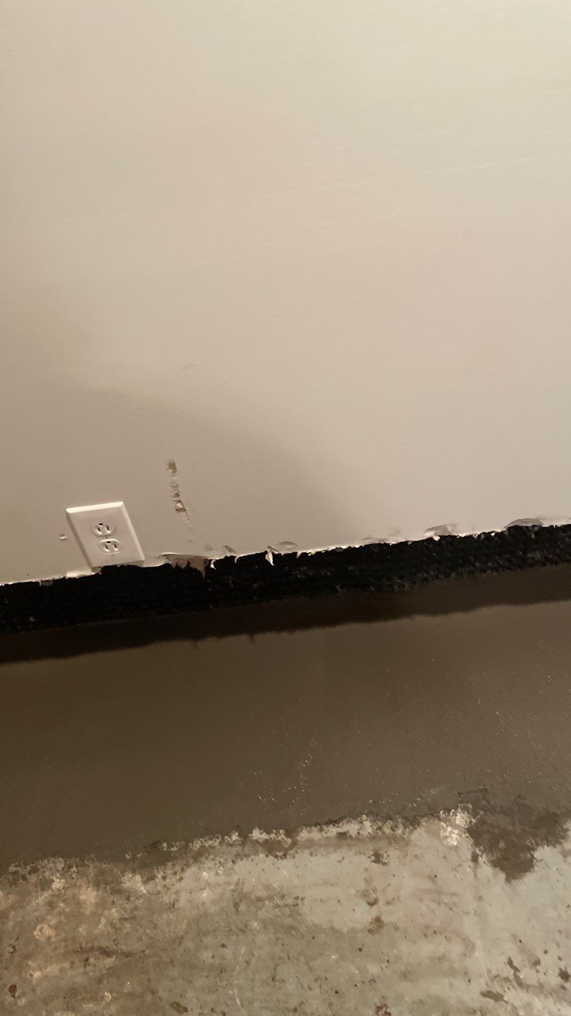 Interior Drain Tile in a Finished South Minneapolis Basement by Waterproofing Northeast