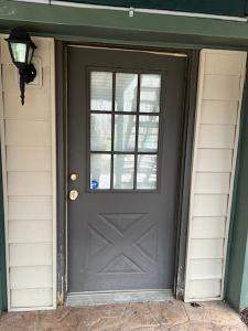 Exterior Entry Door and Garage Door Painting by Legendary Services Company LLC.