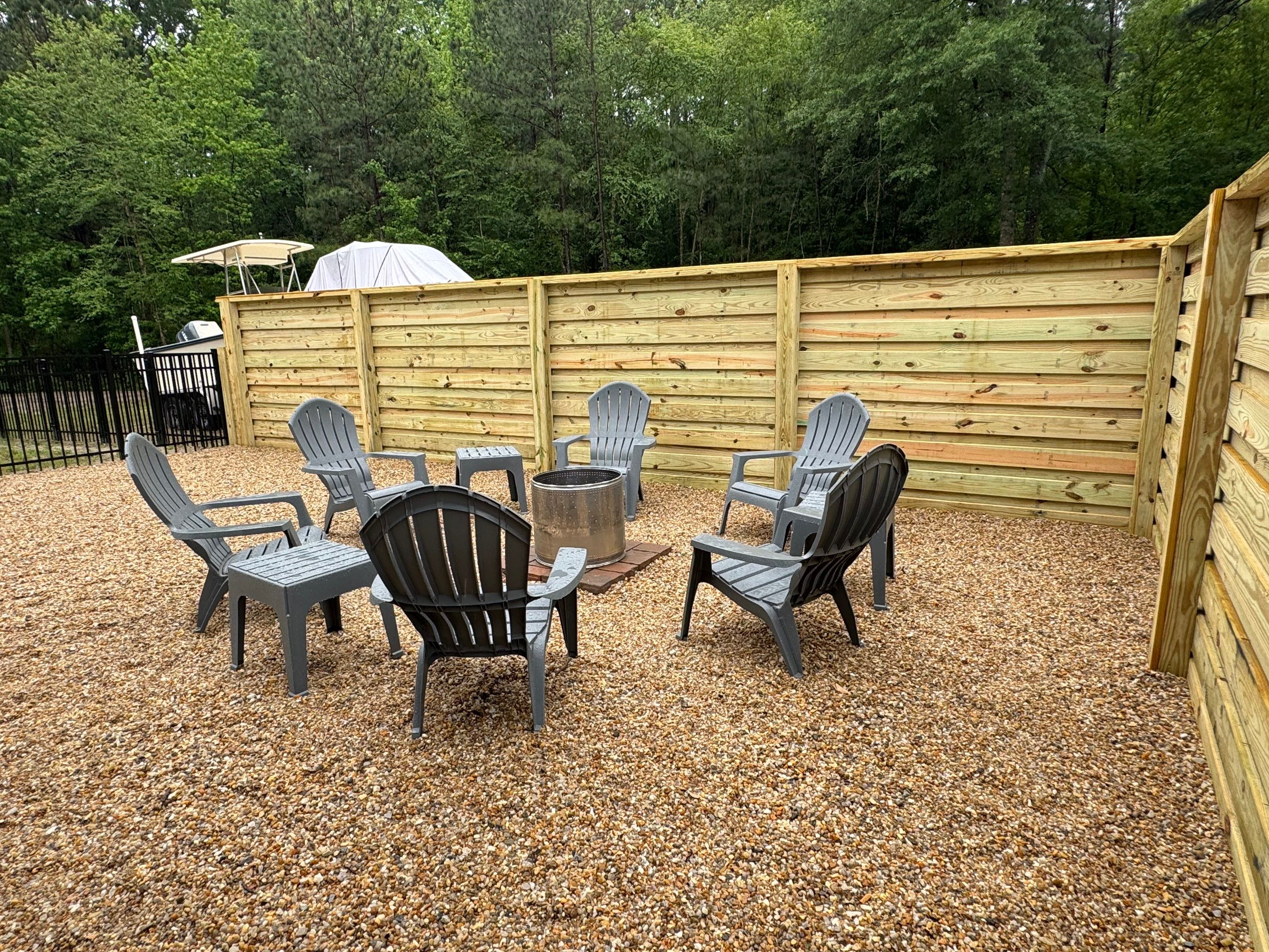 Modern Horizontal Wood Privacy Fence and Backyard Patio in Greenville by Superior Fence and Rail