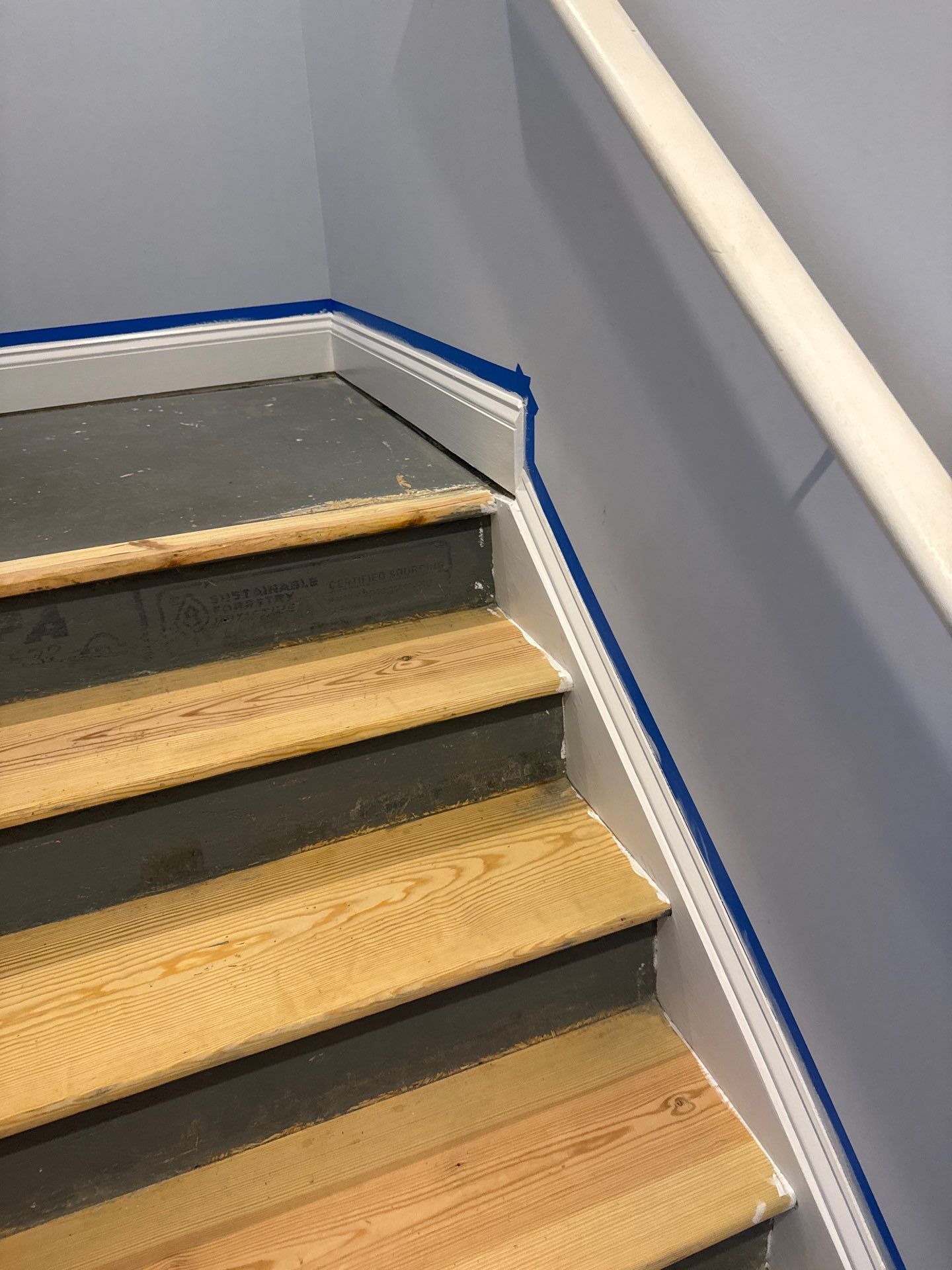 Stairway Installation using t vinyl stair tread and reversibleriser by La Bendicion Contruction Llc