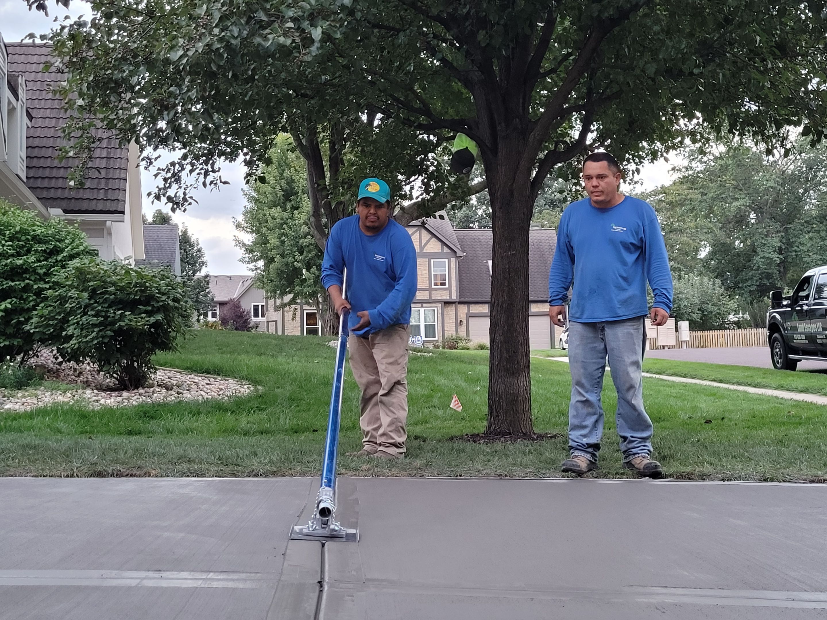 New Driveway and Sidewalk by LAND ESCAPES LLC