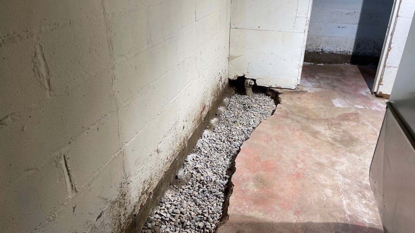Interior Drain Tile & Sump Pump System in North Minneapolis by Waterproofing Northeast