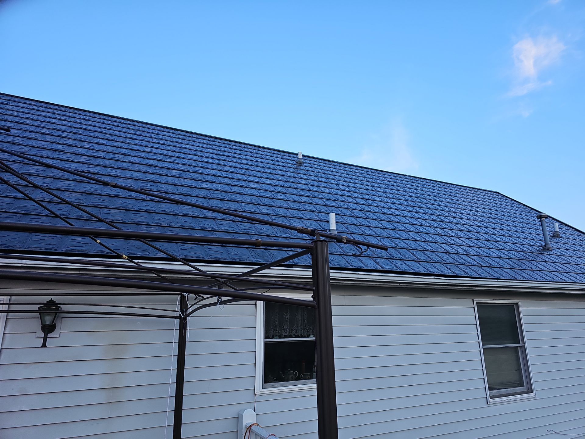 Residential Roofing Installation using Metstar Slate Plus Smooth Black by Nitro Roofing and Construction