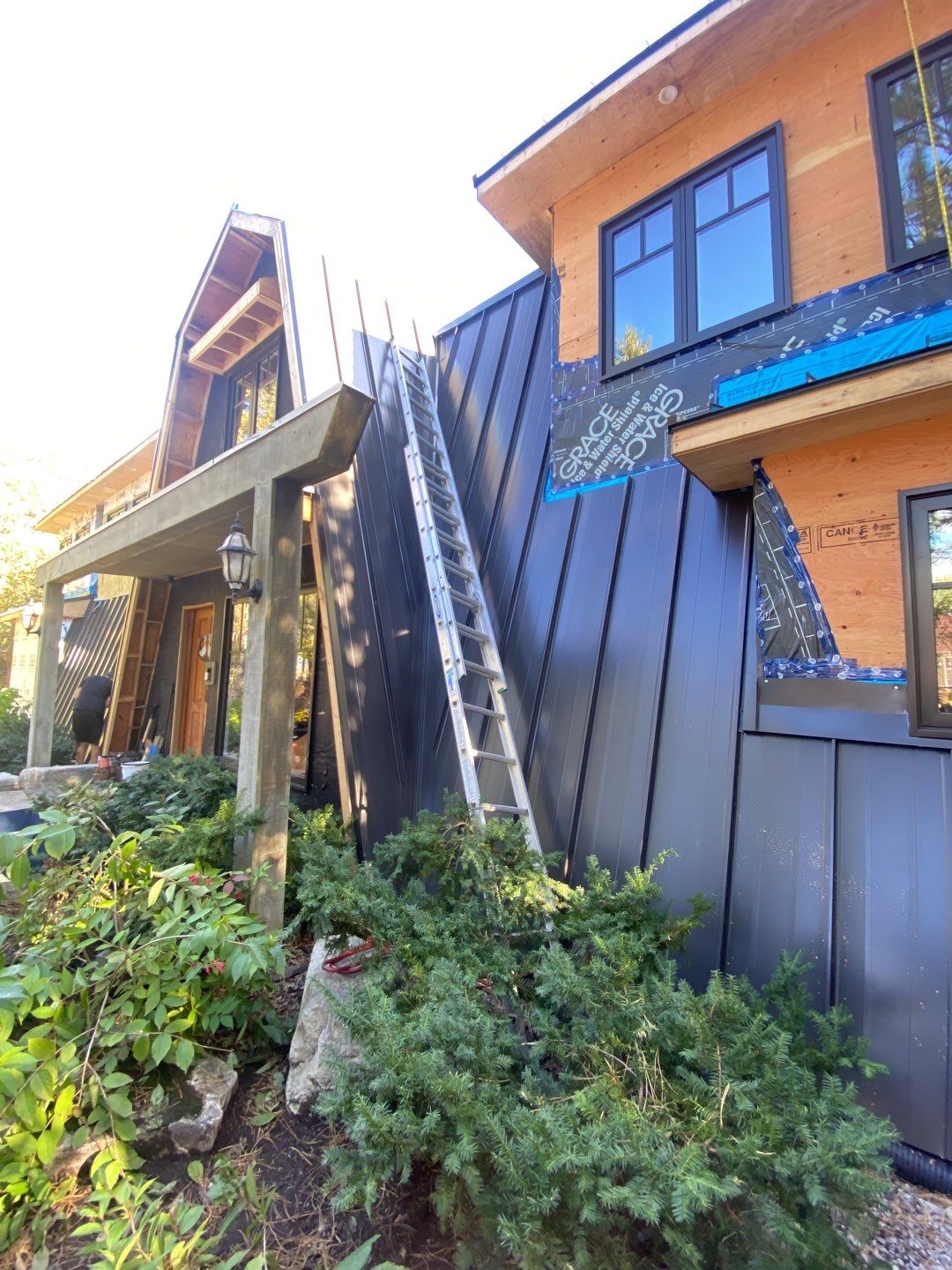 Residential Roofing Installation using 16" Standing Seam Panels by Jay Carter Roofing & Sheet Metal