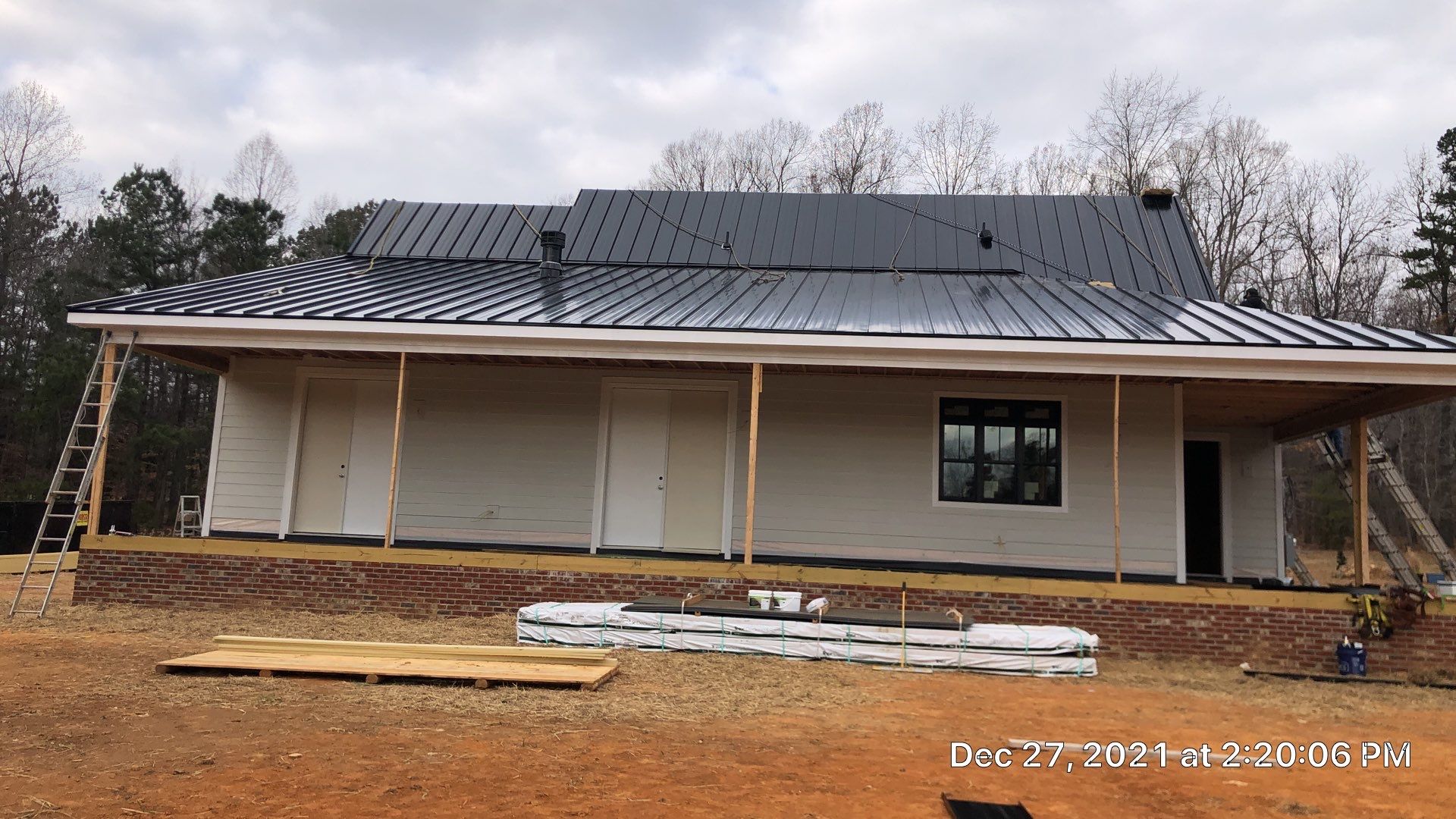 Custom Home Metal Roof Installation by Just In Time Roofing and Restoration