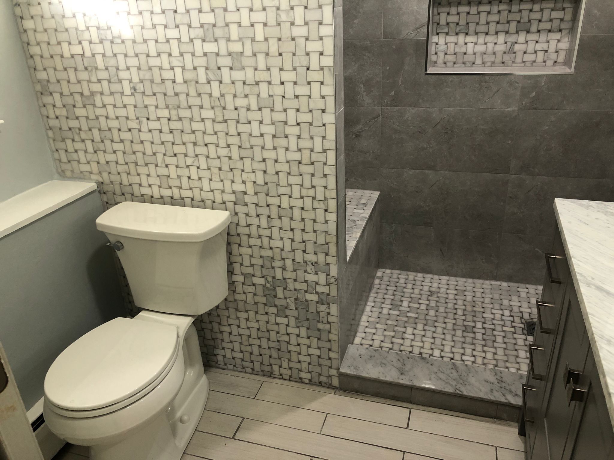 Bathroom Remodel using Tile by Home Concepts Construction