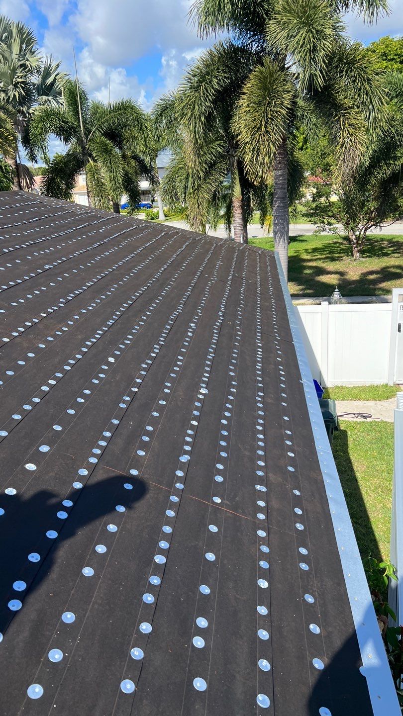 Residential Roofing Installation using 1" Nail strip metal roof by BLUES BROTHERS ROOFING