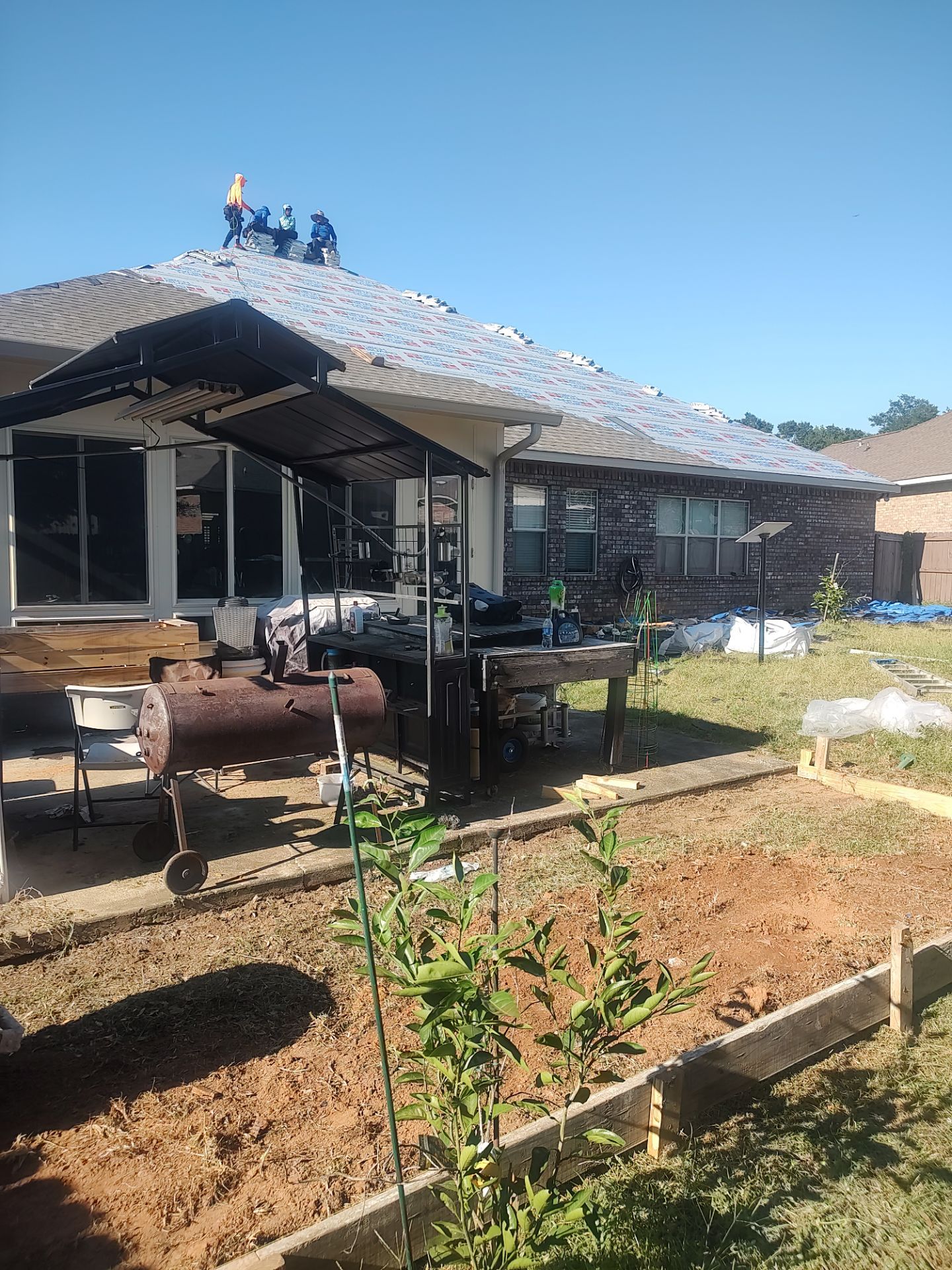 Residential Roof Replacement using ATLAS PROLAM WEATHER WOOD by Elite Roofing LLC