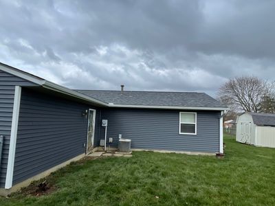 Storm Damage Residential Roof and Siding Installation