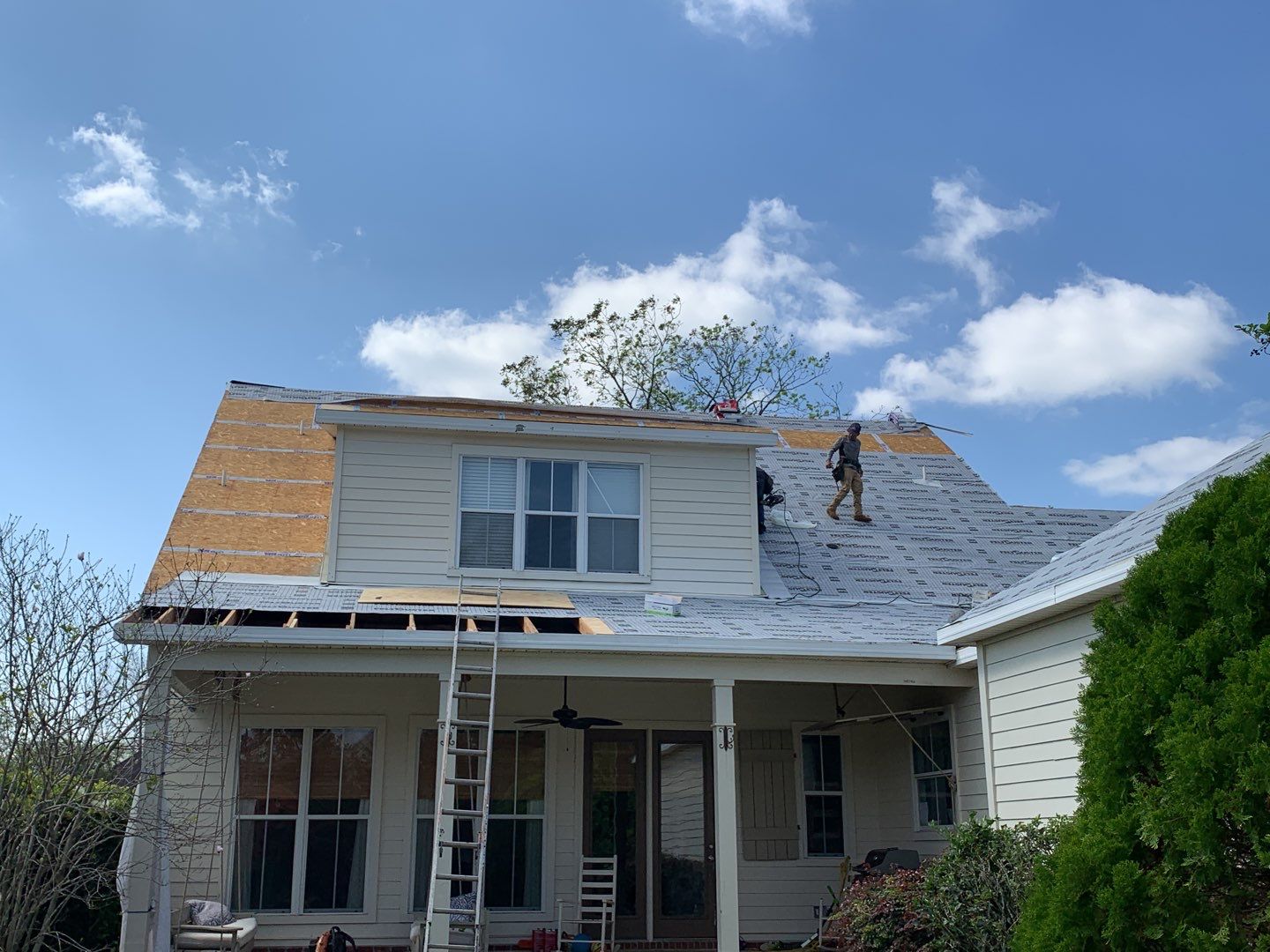 Residential Roofing Installation using Roof Replacement by American Roofing & Construction LLC