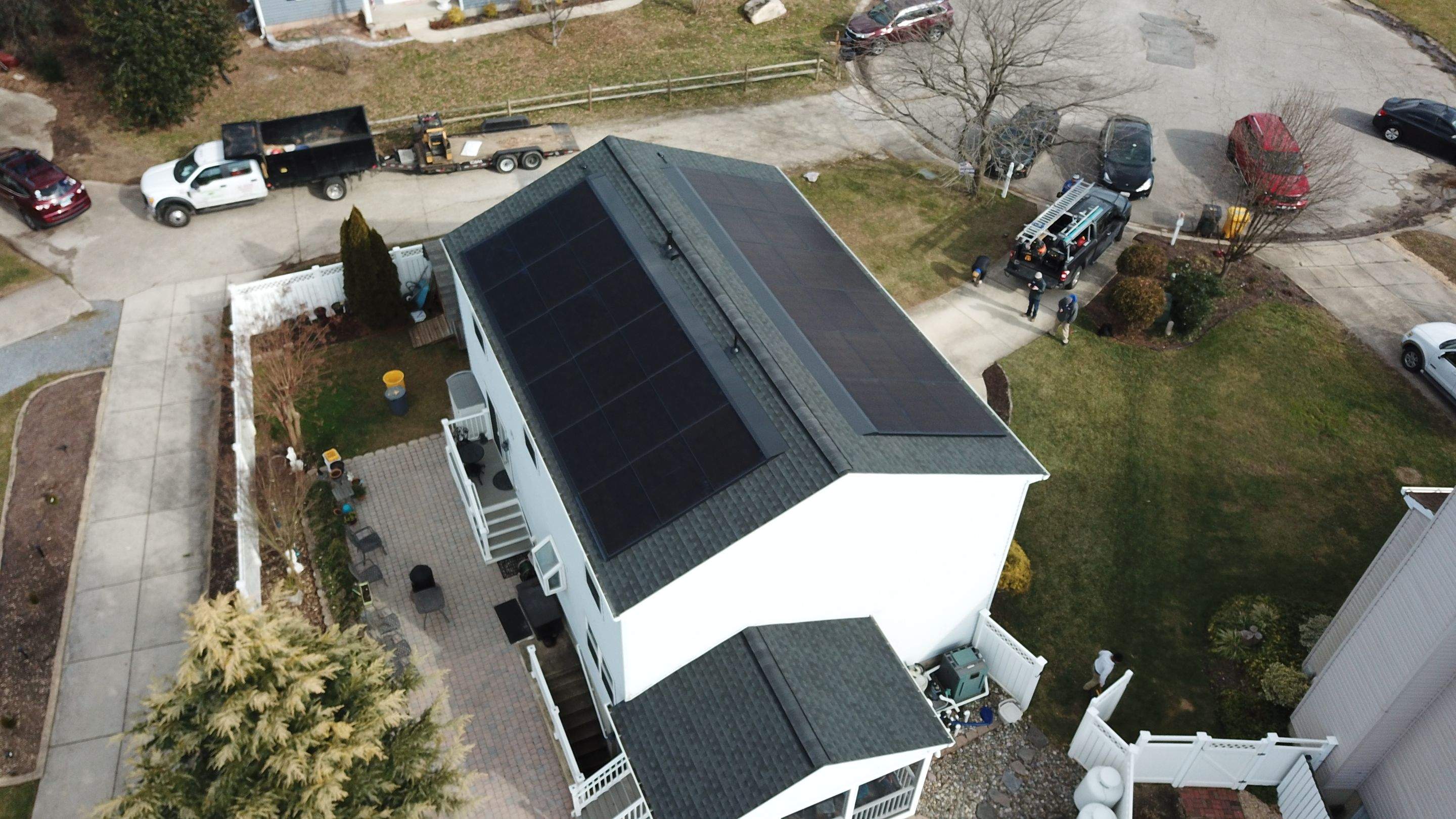 Roof Replacement with GAF Decotech integrated solar panels by American Home Contractors