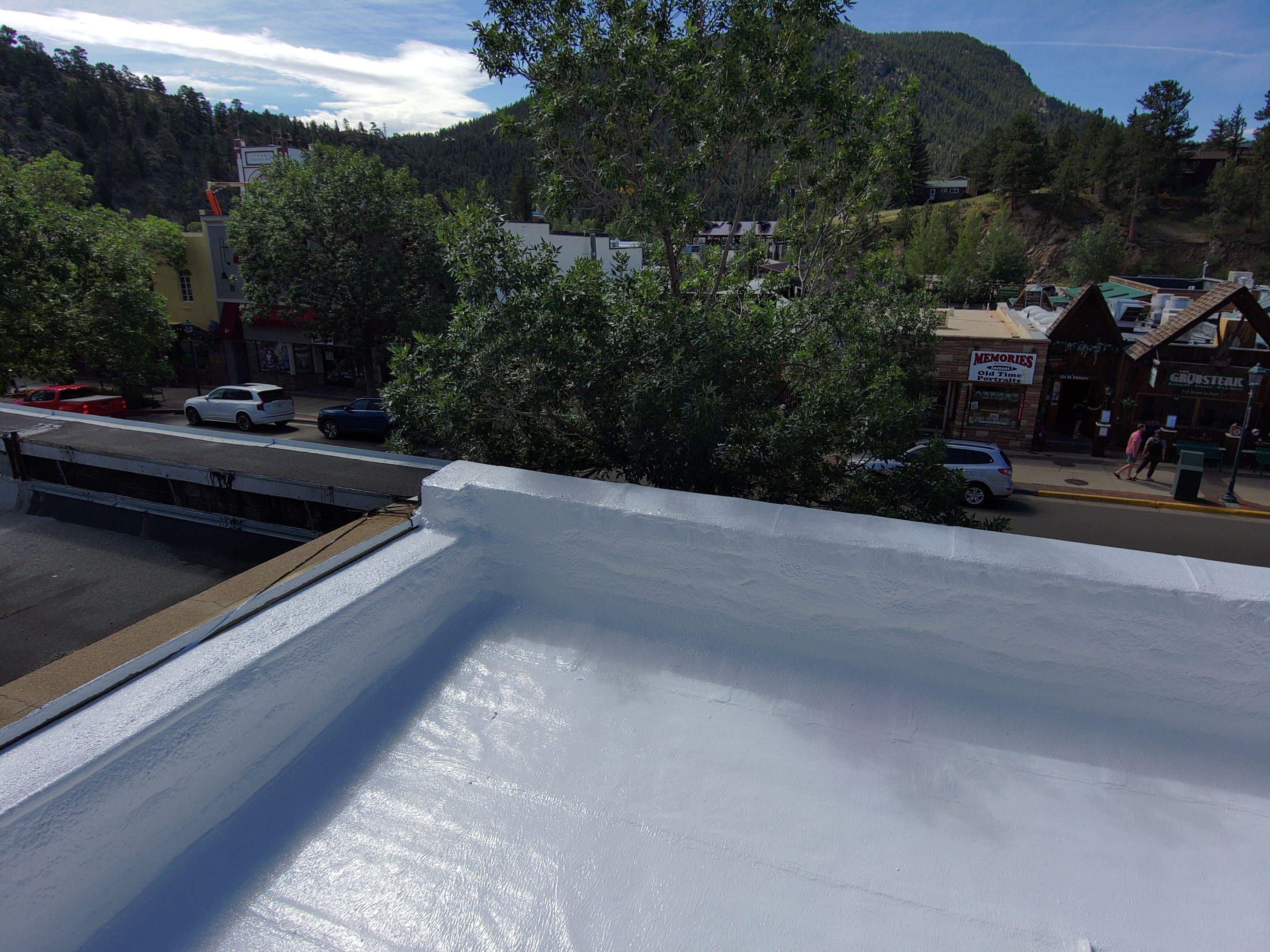 Estes Park "The Taffy Shop" Before & After Gaco Coating by Blue Peaks Roofing LLC