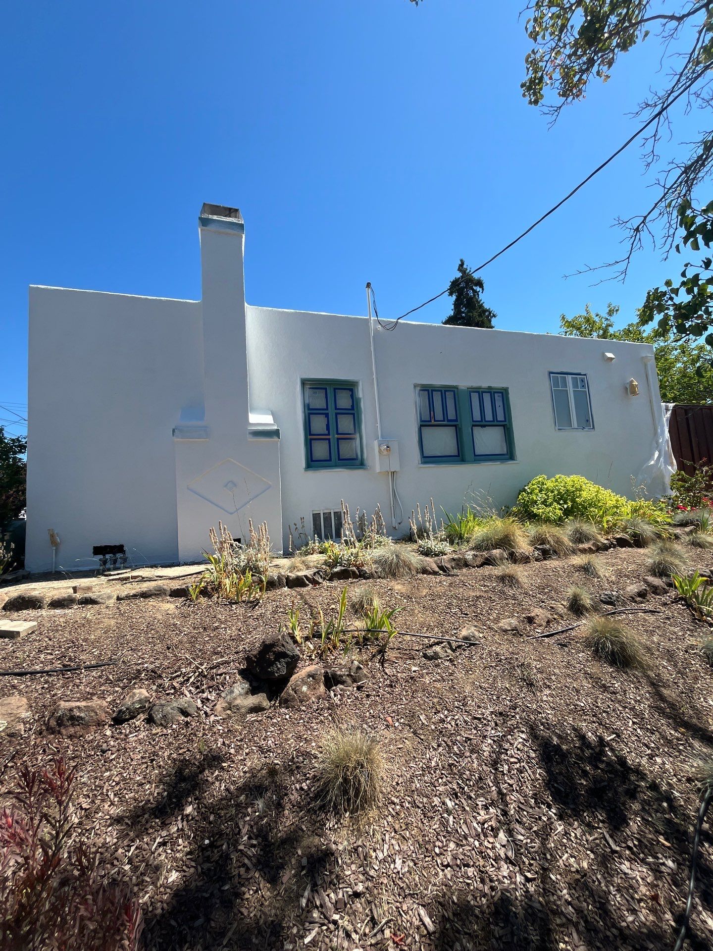 Exterior Transformation with Fresh Stucco and elastomeric system for waterproofing by Herrera’s Bay Area Painting inc.