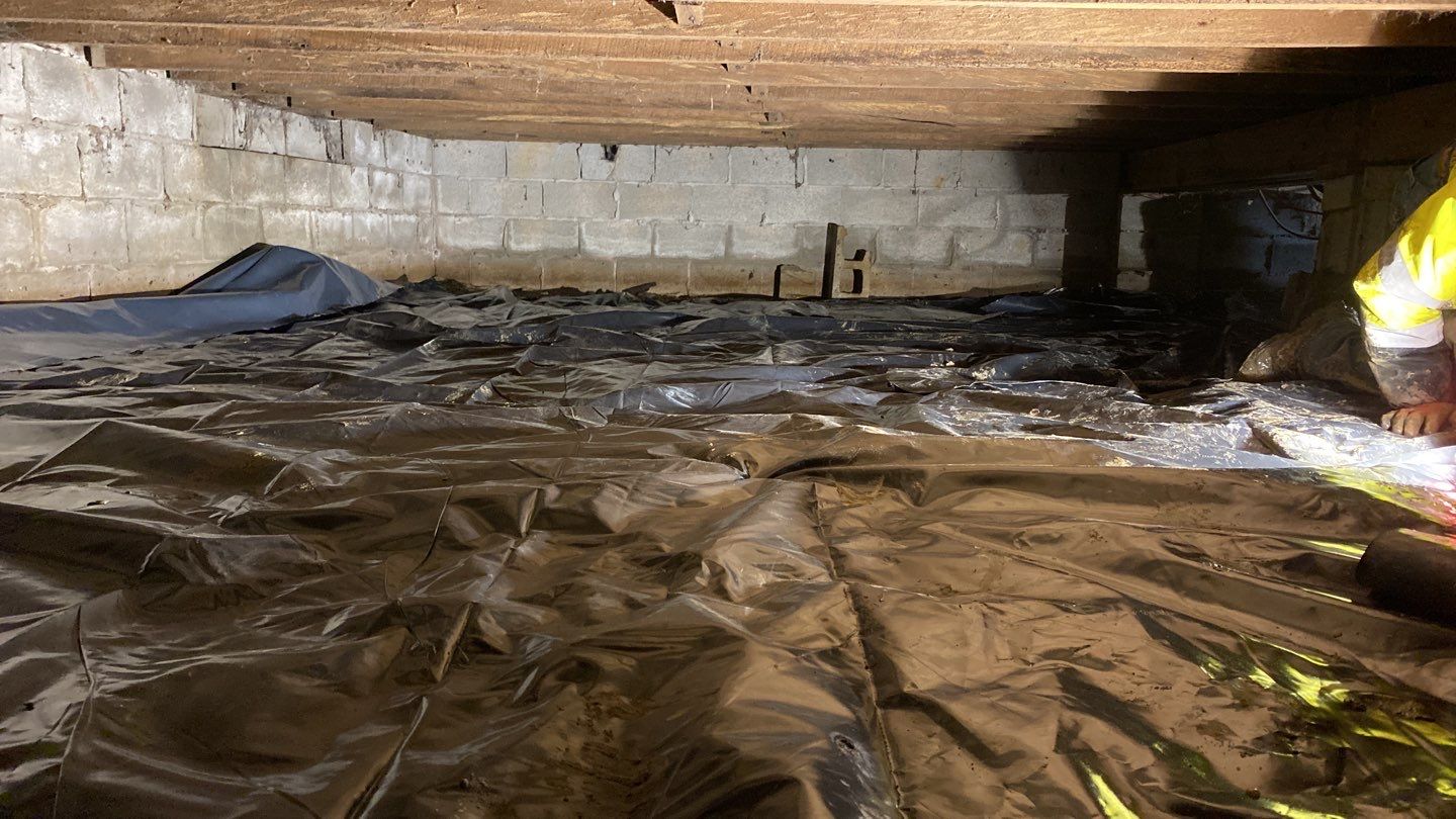 Crawl space encapsulation and Waterproofing using GrateDrain Waterproofing System by Toledo Basement Repair 