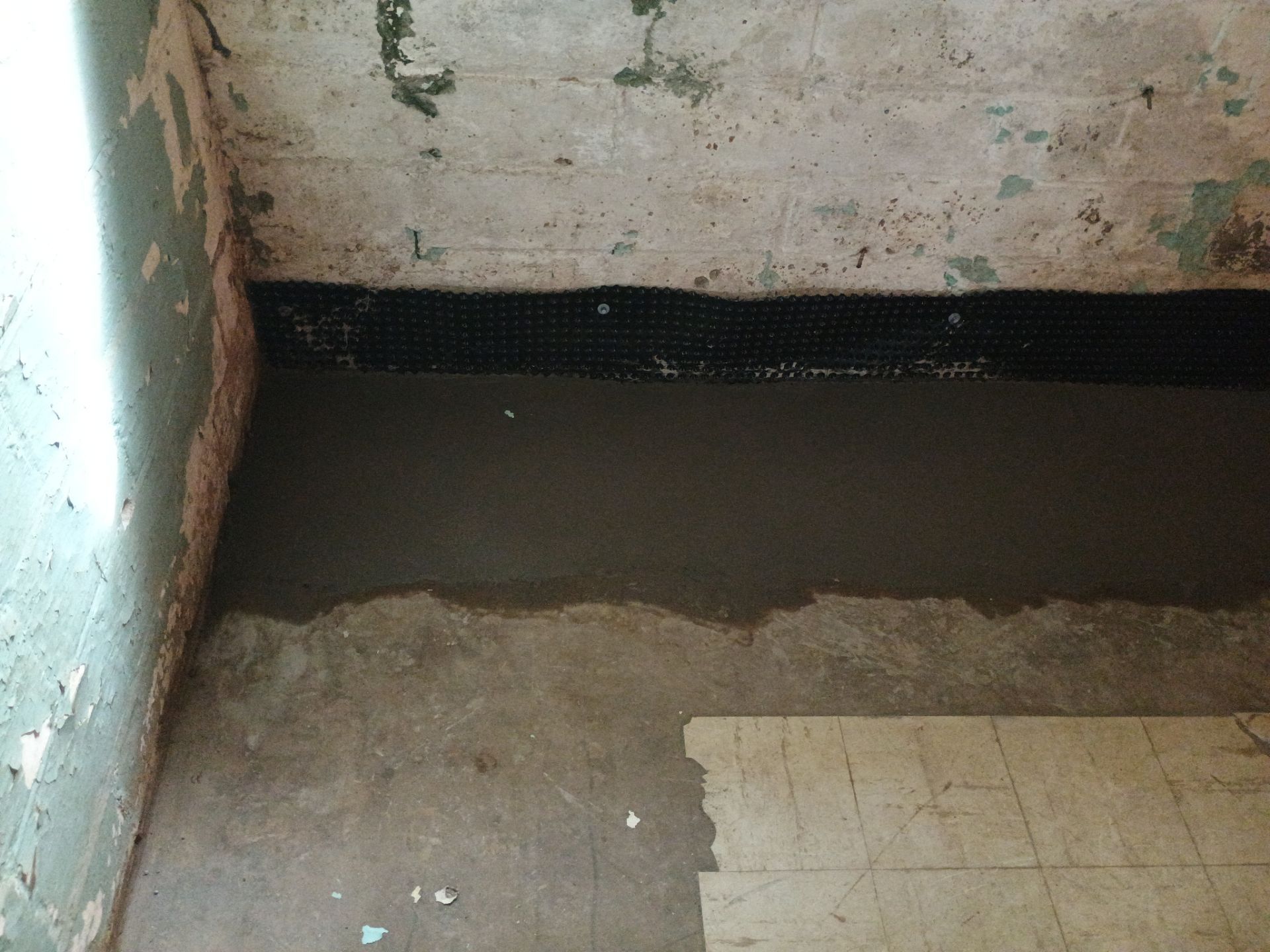 Interior Drain Tile for a South Minneapolis Basement by Waterproofing Northeast