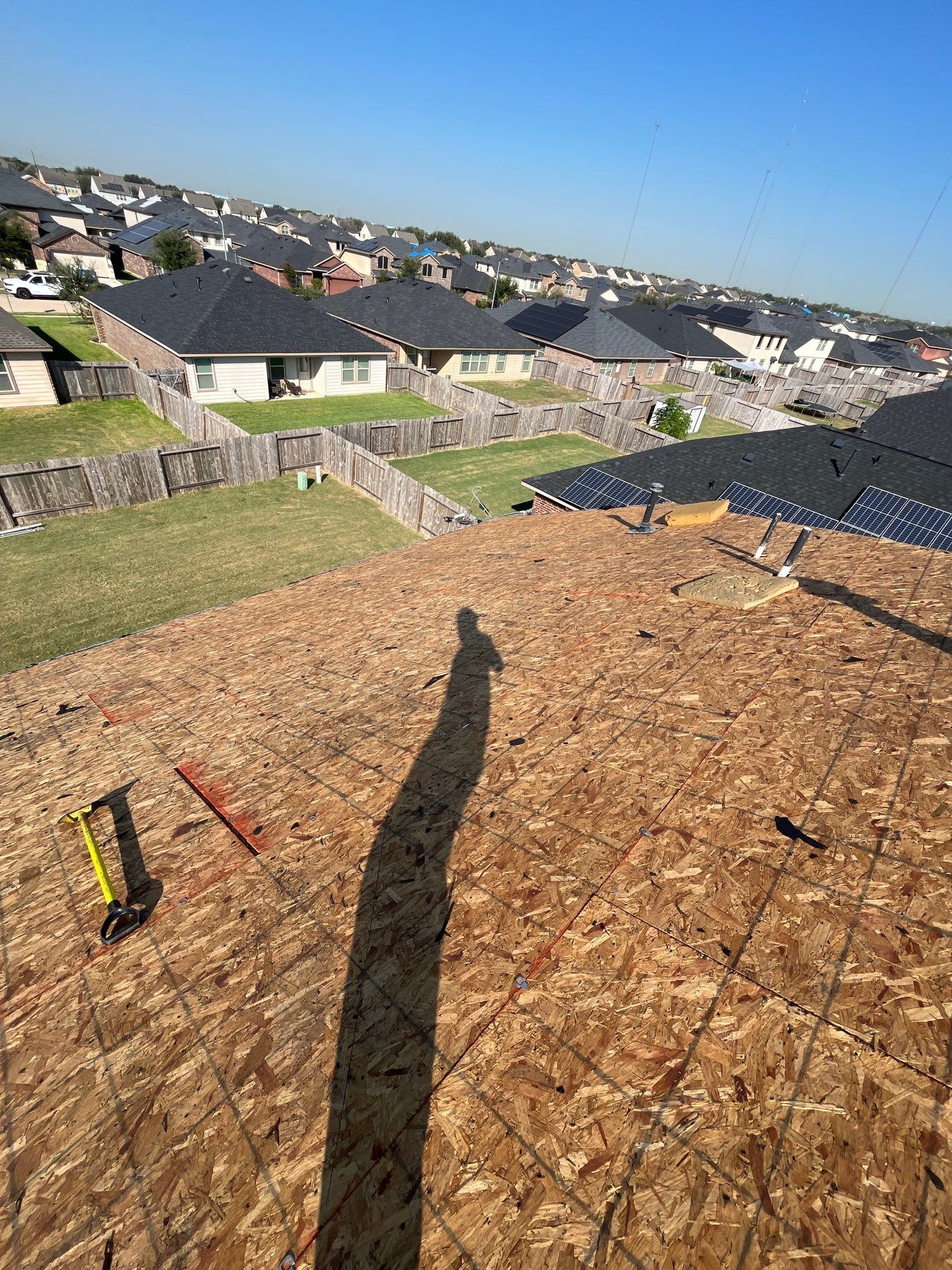 Reroof with Solar panel Detach and Reset by Berry Good Roofing 