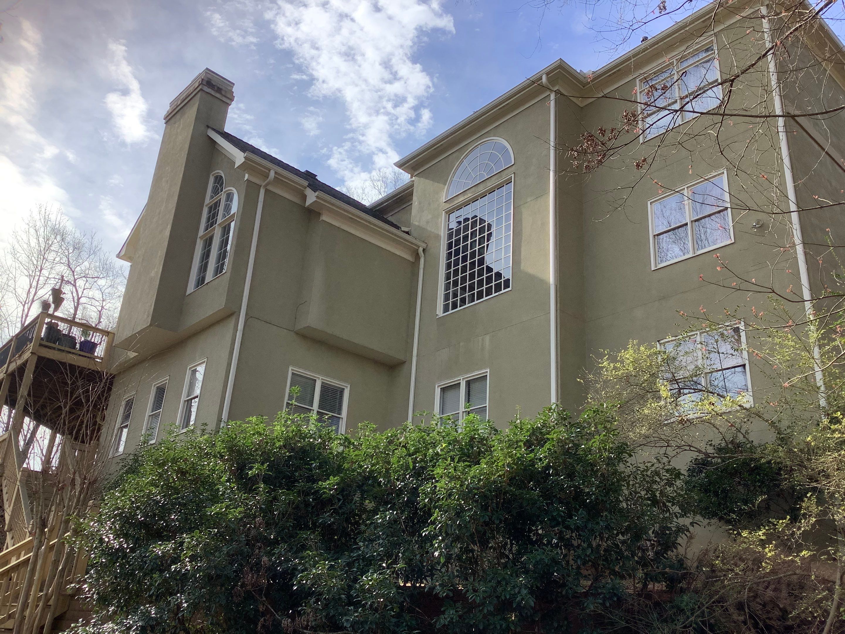 Exterior Stucco Painting and White Trim Update in Roswell by Swift Home Renovations