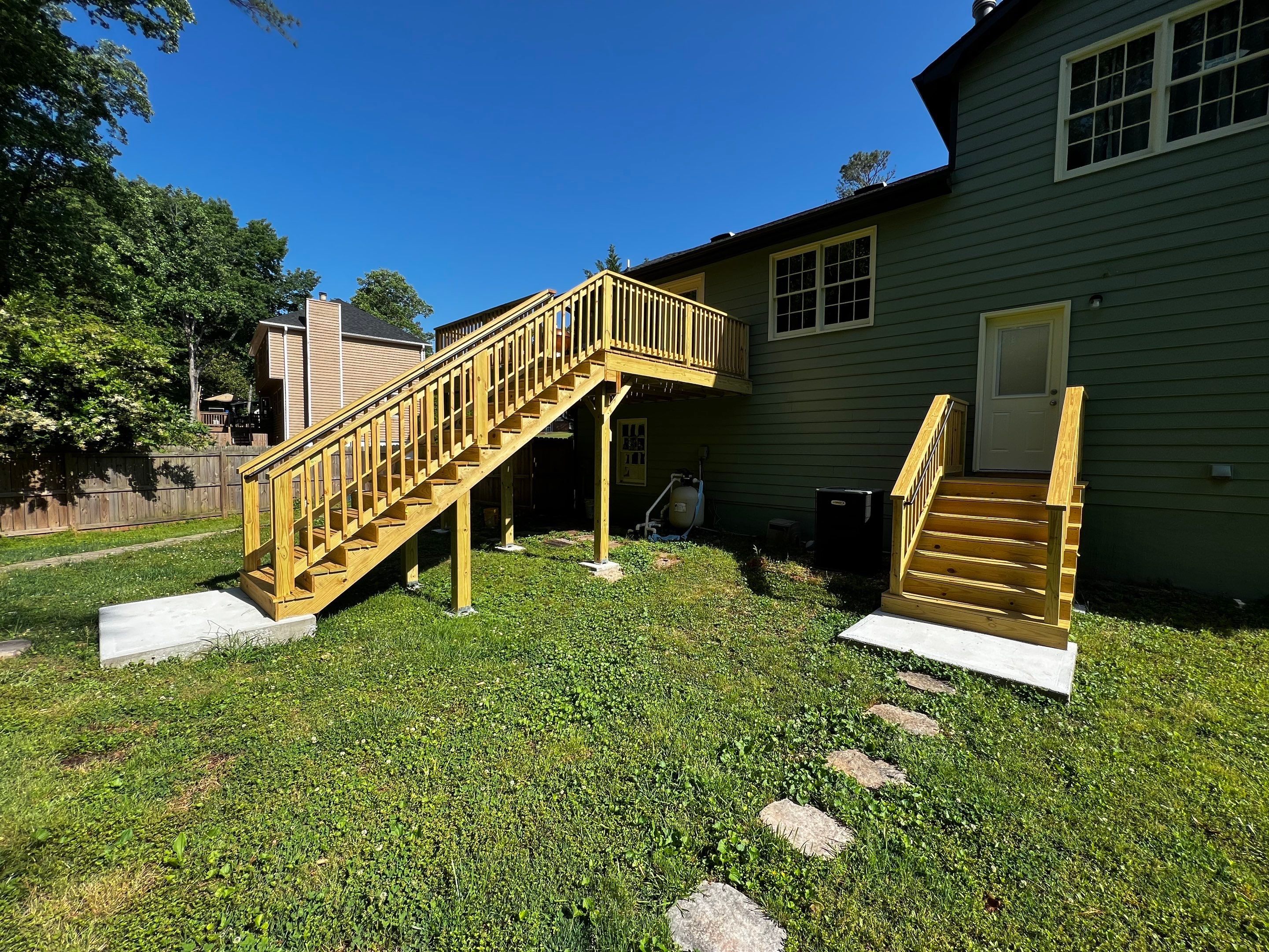 Elevated Pressure-Treated Wood Deck Replacement in Marietta by Swift Home Renovations