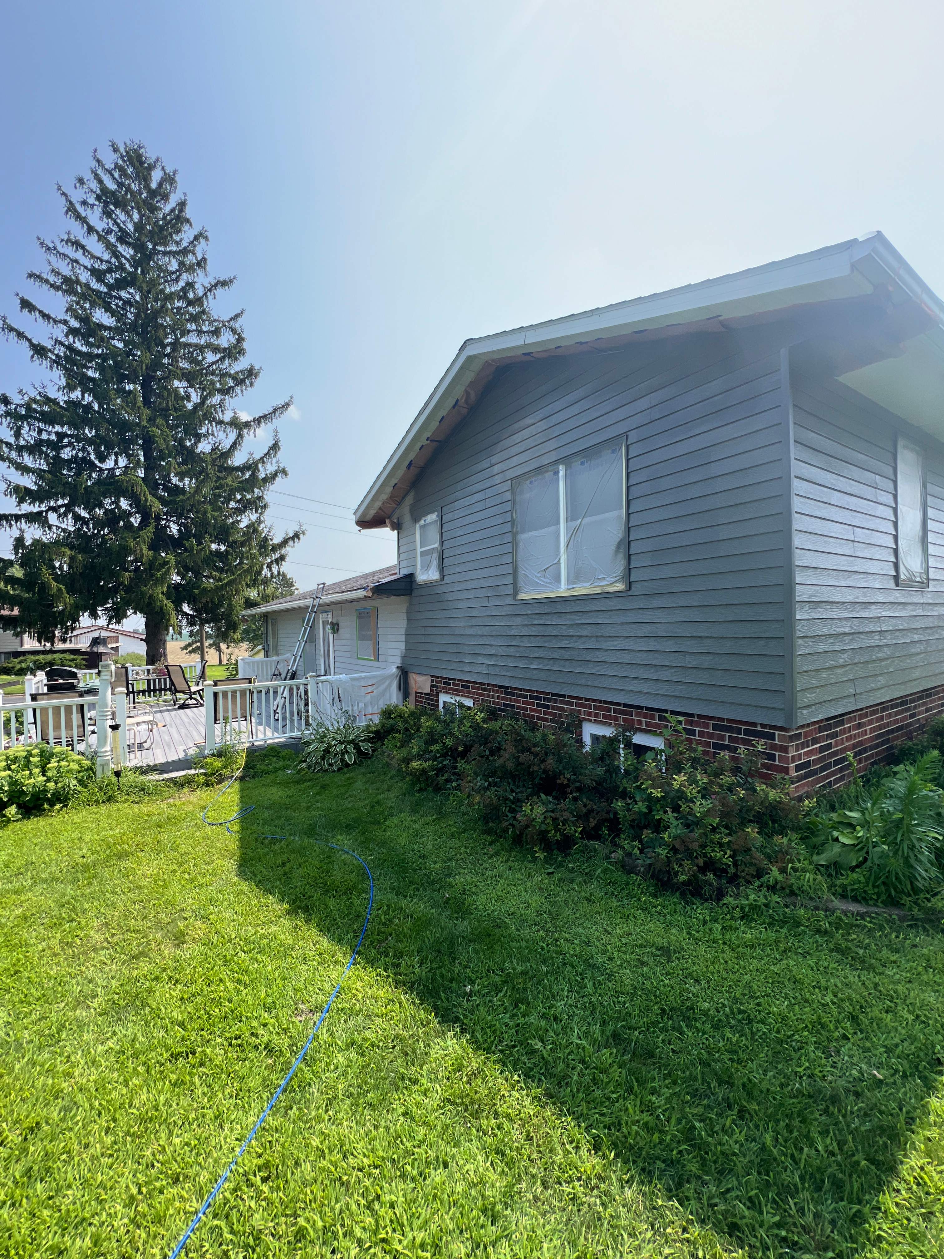 Aluminum Siding Repaint by Grandview Painting