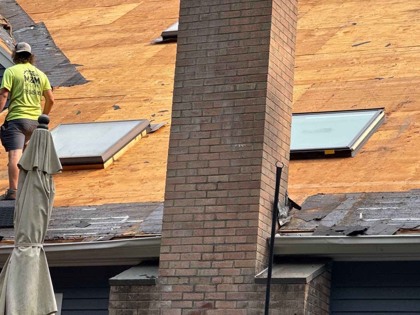 Solar-Ready Roof Replacement with GAF Pewter Gray Shingles & VELUX Skylights by Sensible Home Solutions