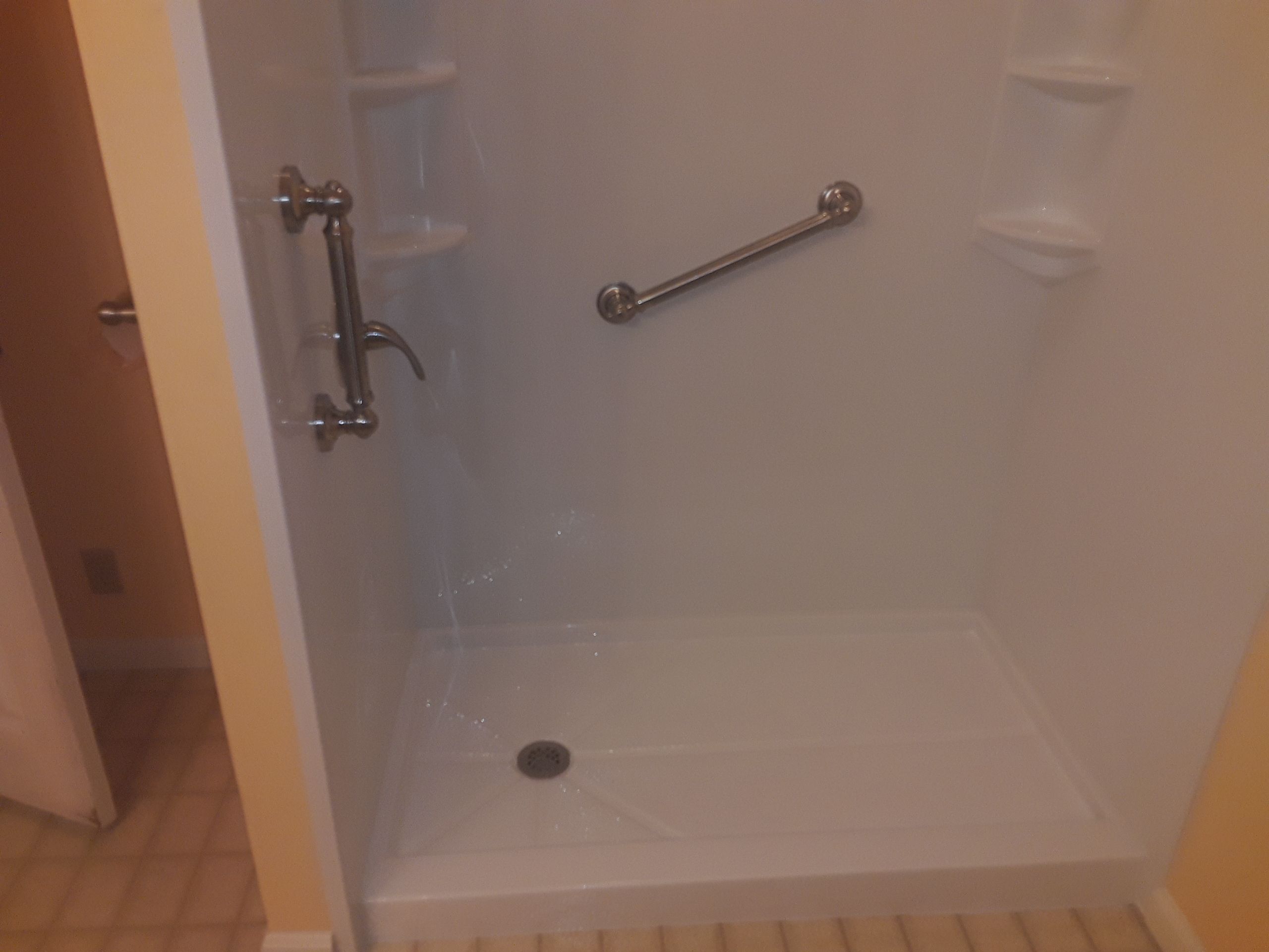 Tub to Shower Conversion using BCI Acrylic Shower System by Secure Construction Company Inc