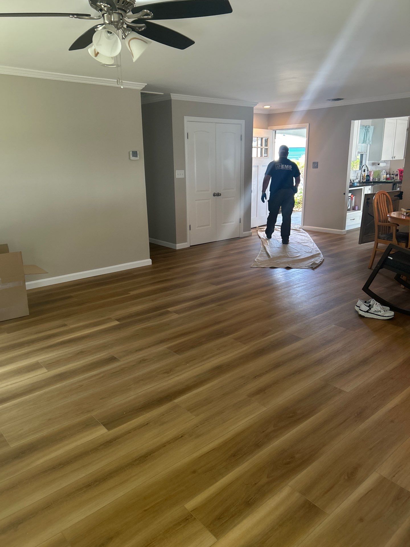 Water Damage Restoration and Full Laminate Floor Installation in Stony Brook by EMS Restoration Corp