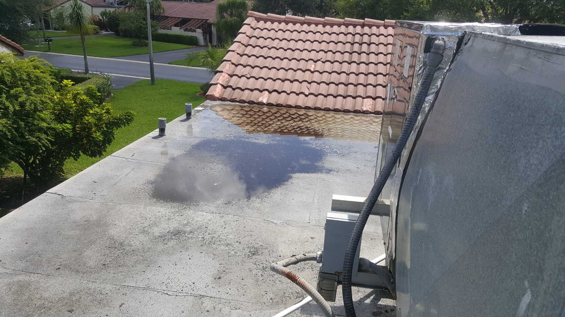 Skylight Repair and Flat Roof Sealant Application in Boca Raton by Aastro Roofing