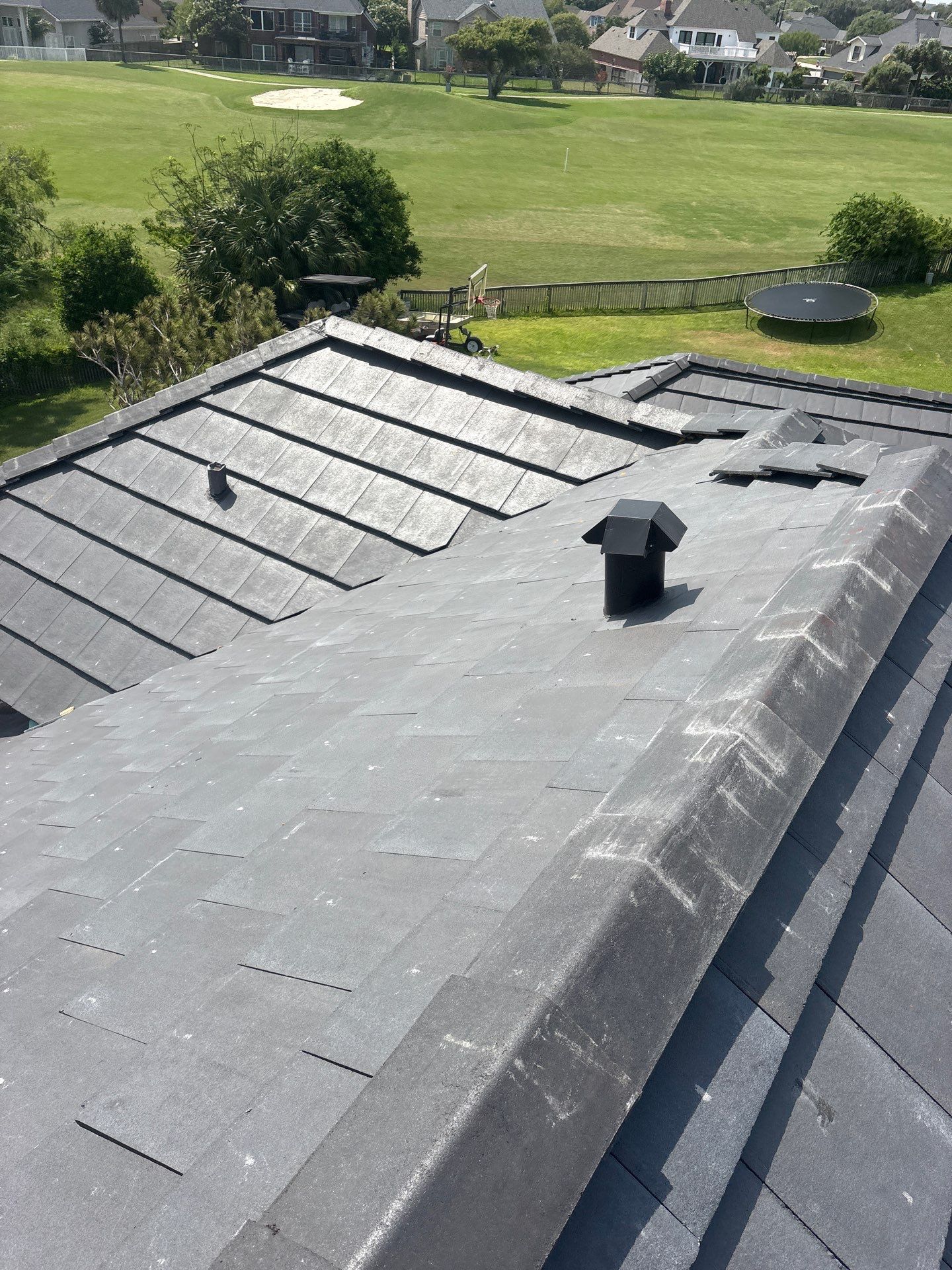 Golf-Proof Tile Roof by Bayfront Roofing and Construction