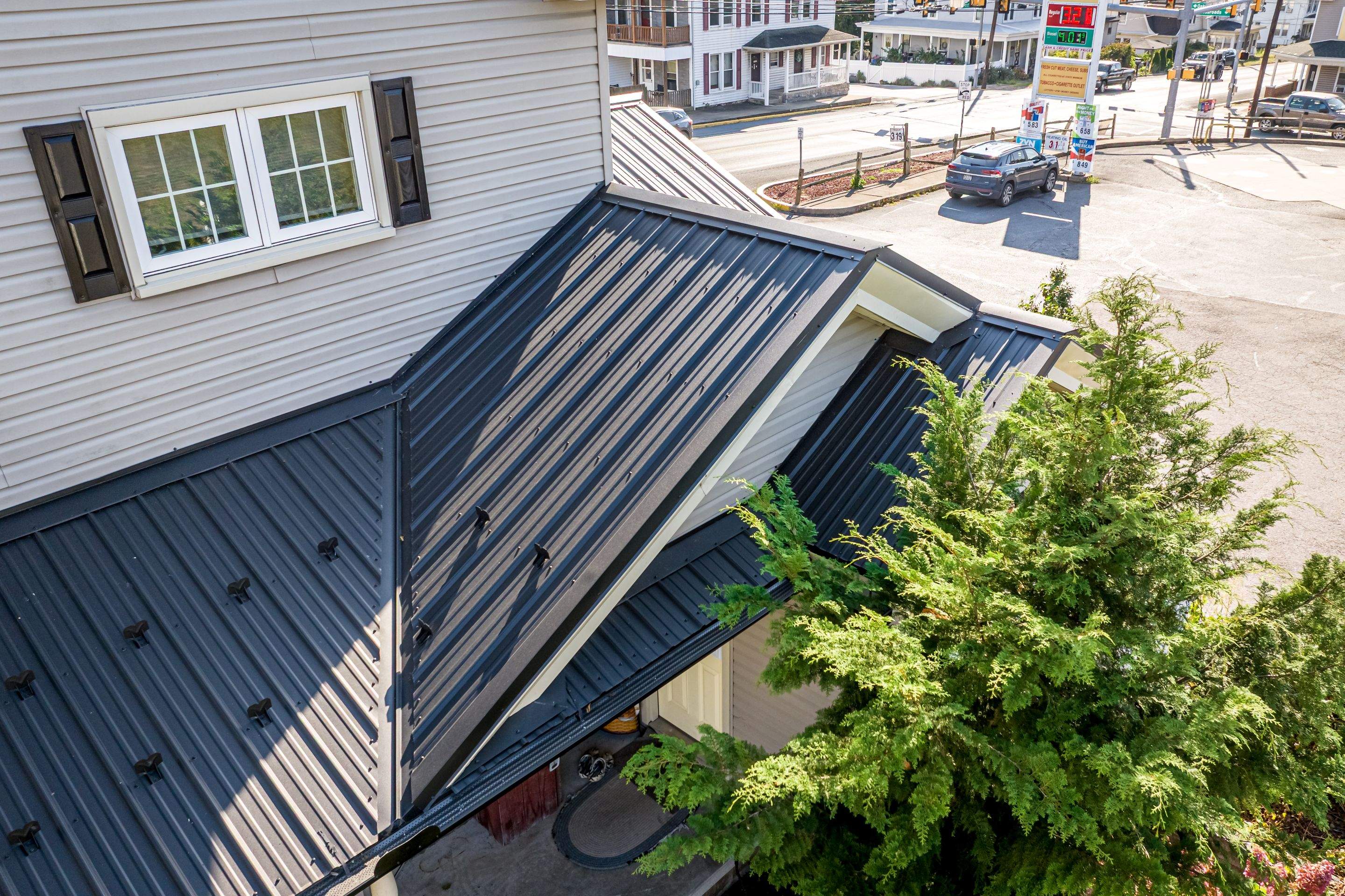 Textured Black Meal Roof by Esh Builders