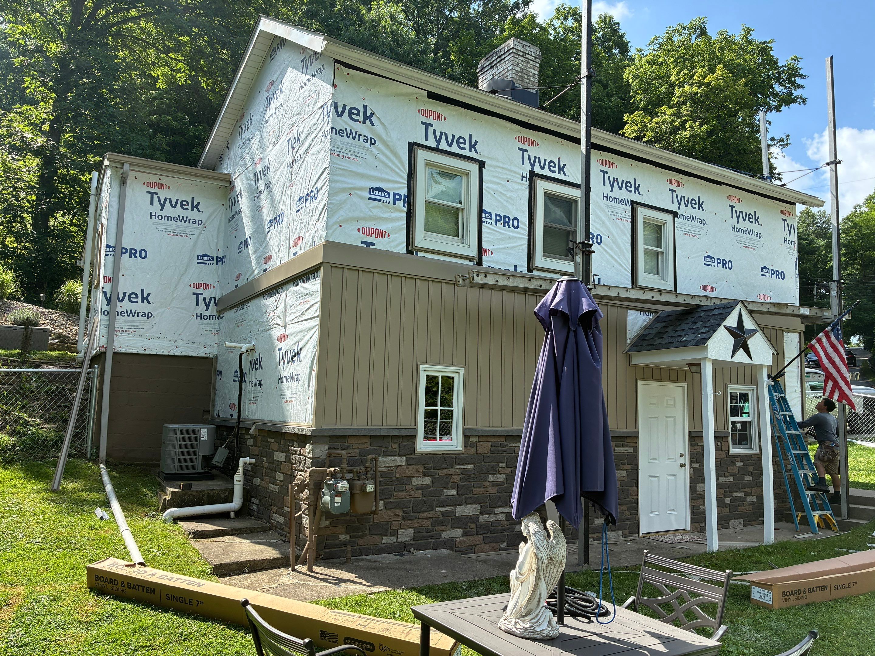 Jefferson Hills Vertical Board and Batten Siding and TandoStone Renovation by Ideal Siding Pittsburgh