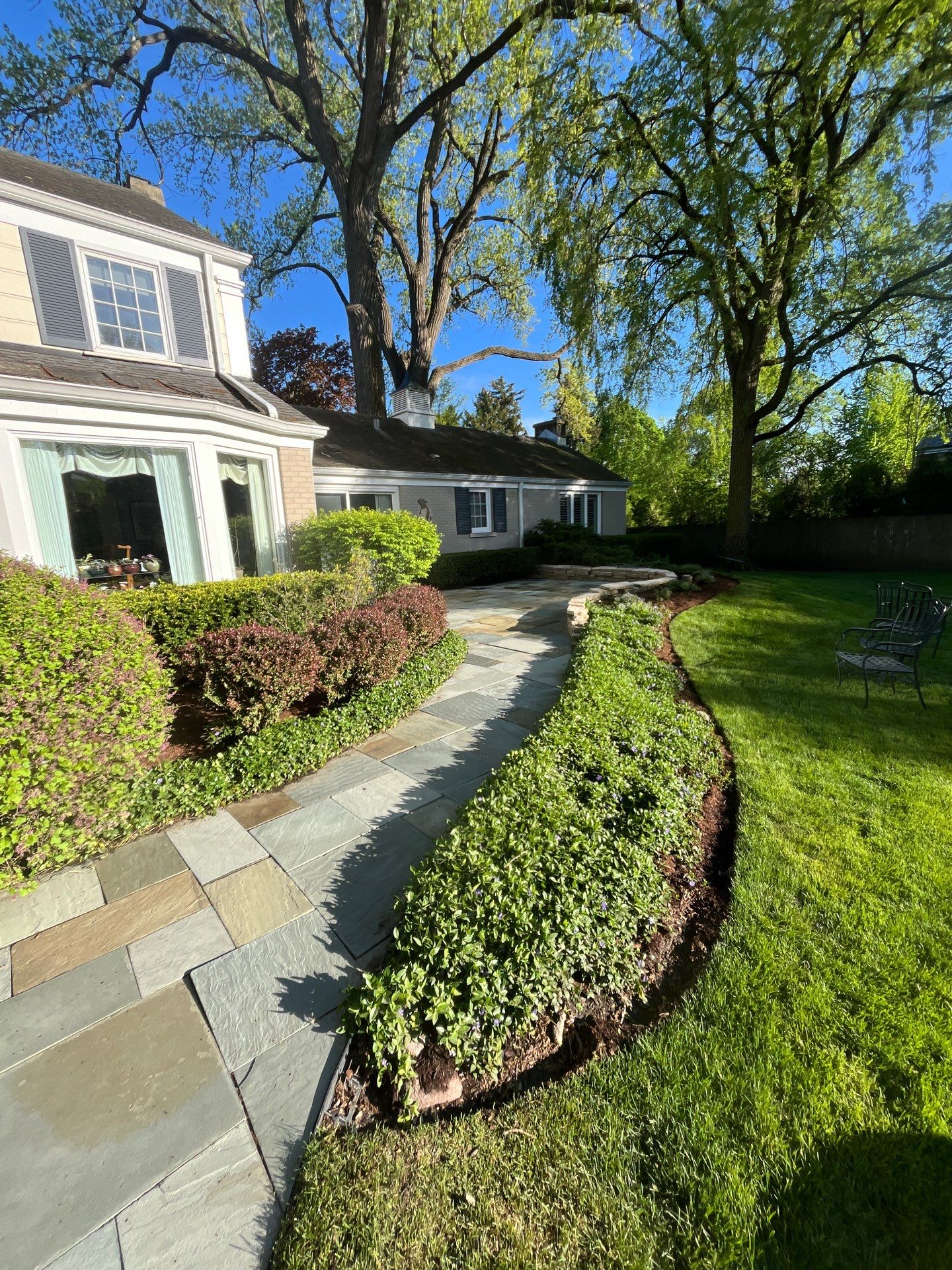 natural stone using Algaecide, soft wash soap by Northern Power Washing LLC.