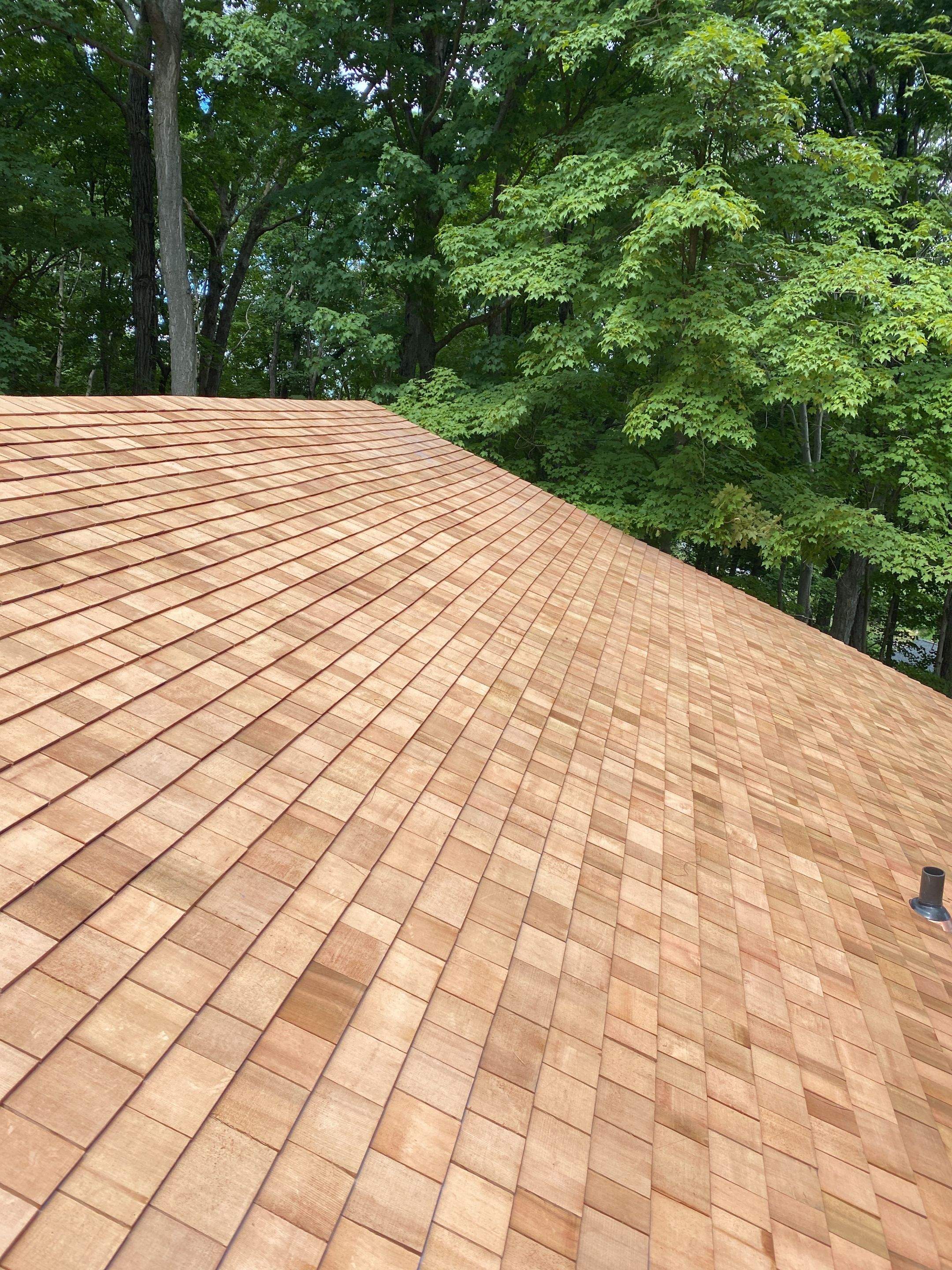Residential Roofing Installation using Wood Shake by A Plus Exterior