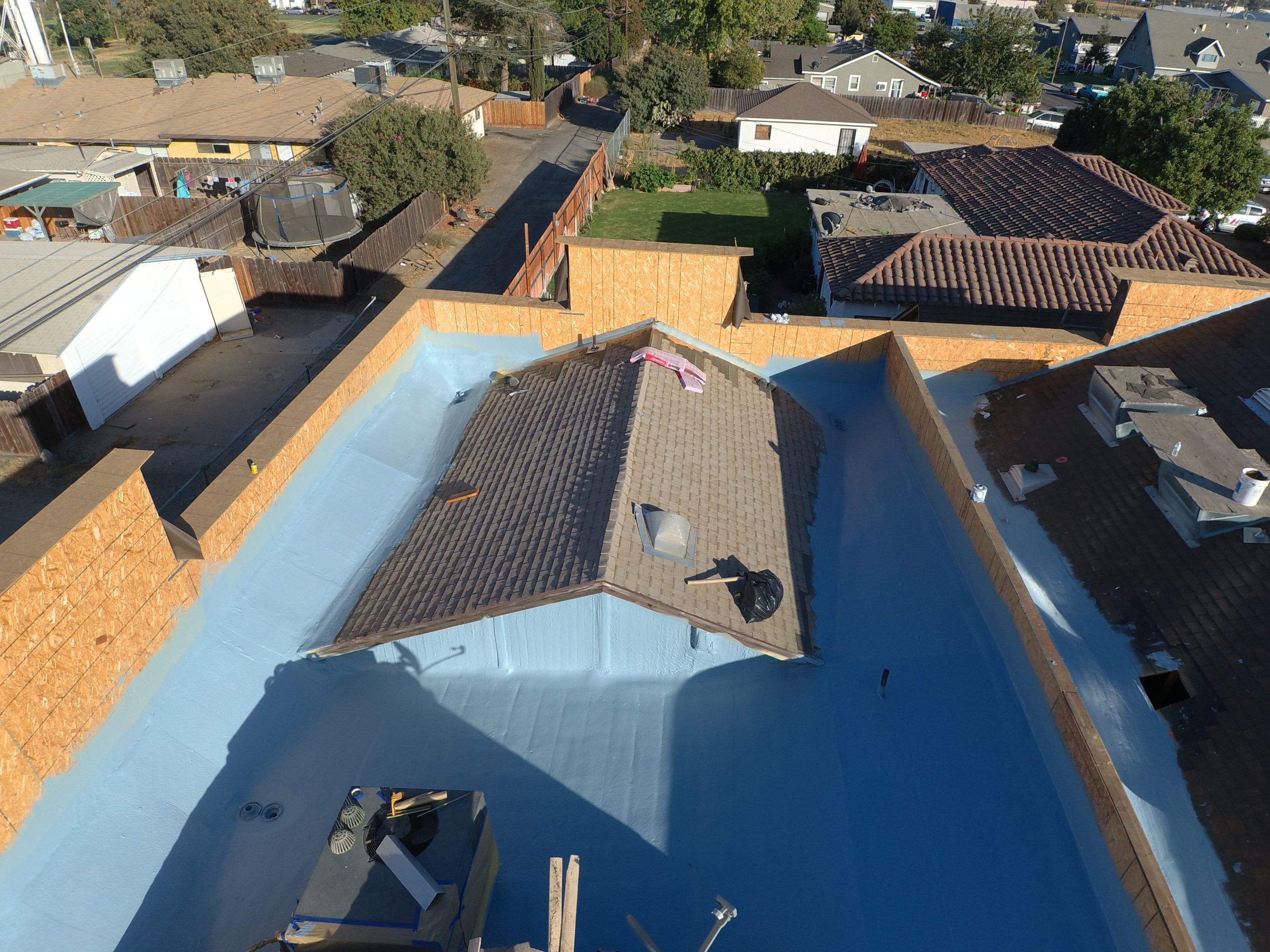Spray foam and coatings using Conklin Benchmark/PUMA XL coatings and spray foam by Straight Edge Roofing Inc