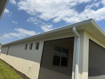Aluminum Seamless Gutters using 3X4 Elbow Downspout in Cape Coral FL