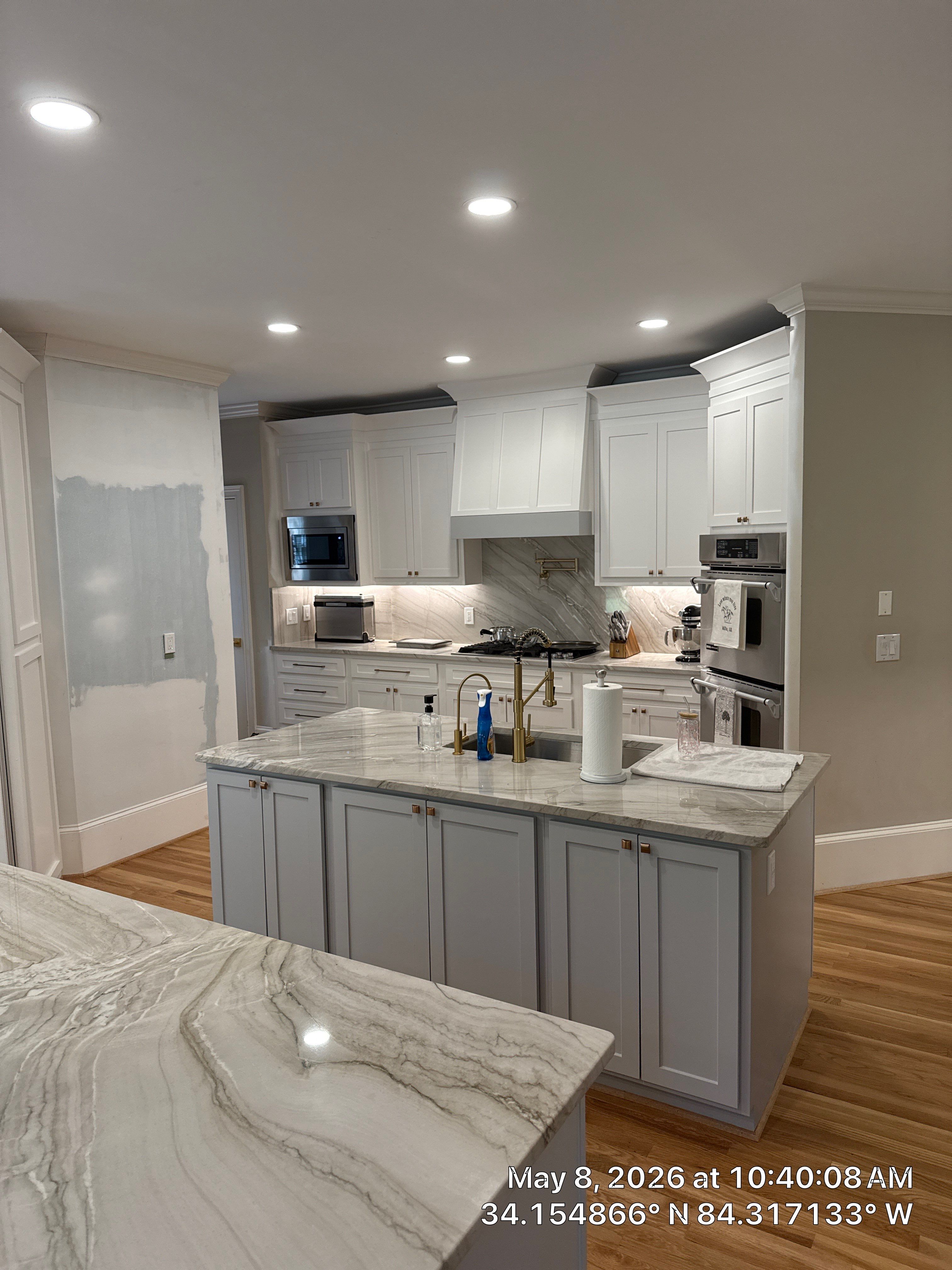 Alpharetta Kitchen Remodel Featuring Double Islands and White Quartz by Heart & Home Kitchen & Bath Remodeling LLC