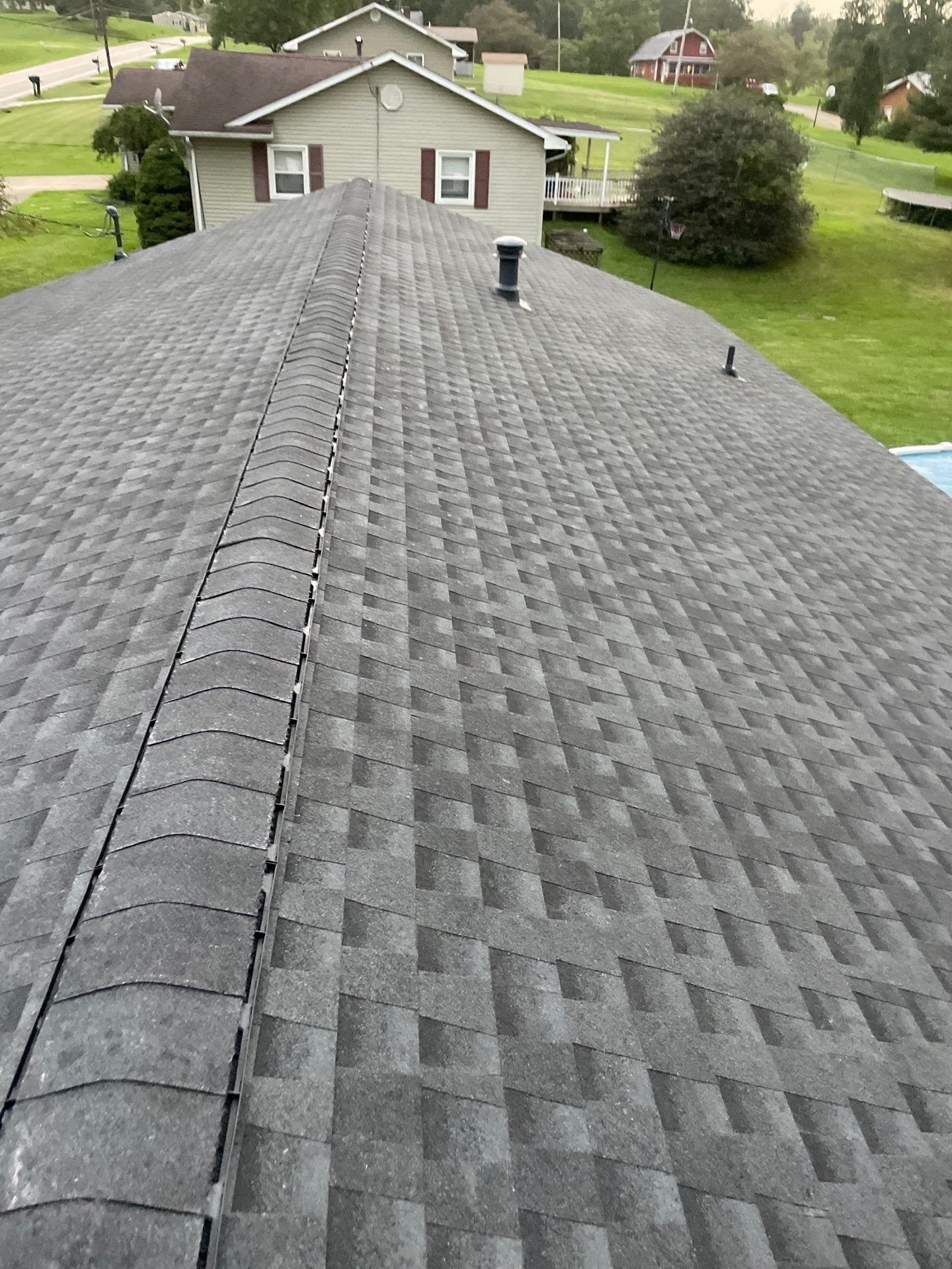 Residential Roofing Installation using GAF Timberline HDZ Charcoal by Rainstoppers Roofing