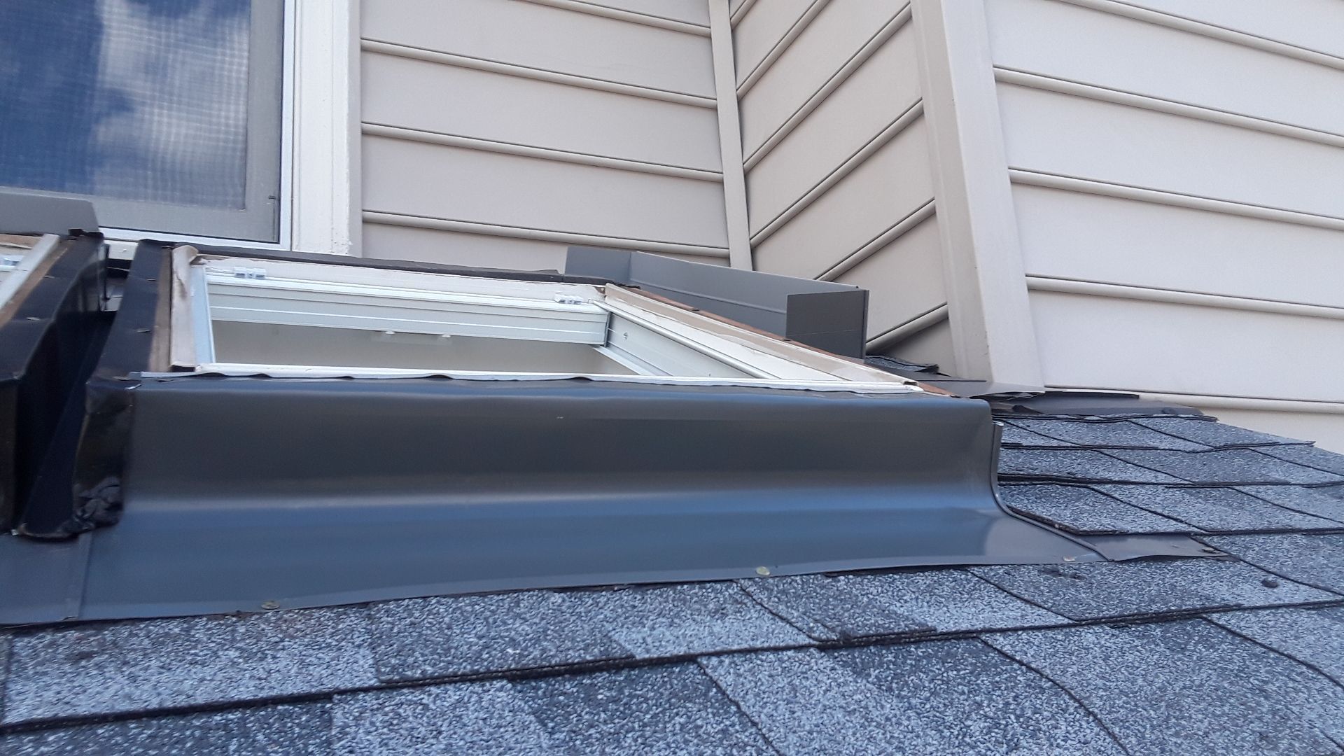 Roof, Window, and Skylight Replacement by American Home Contractors