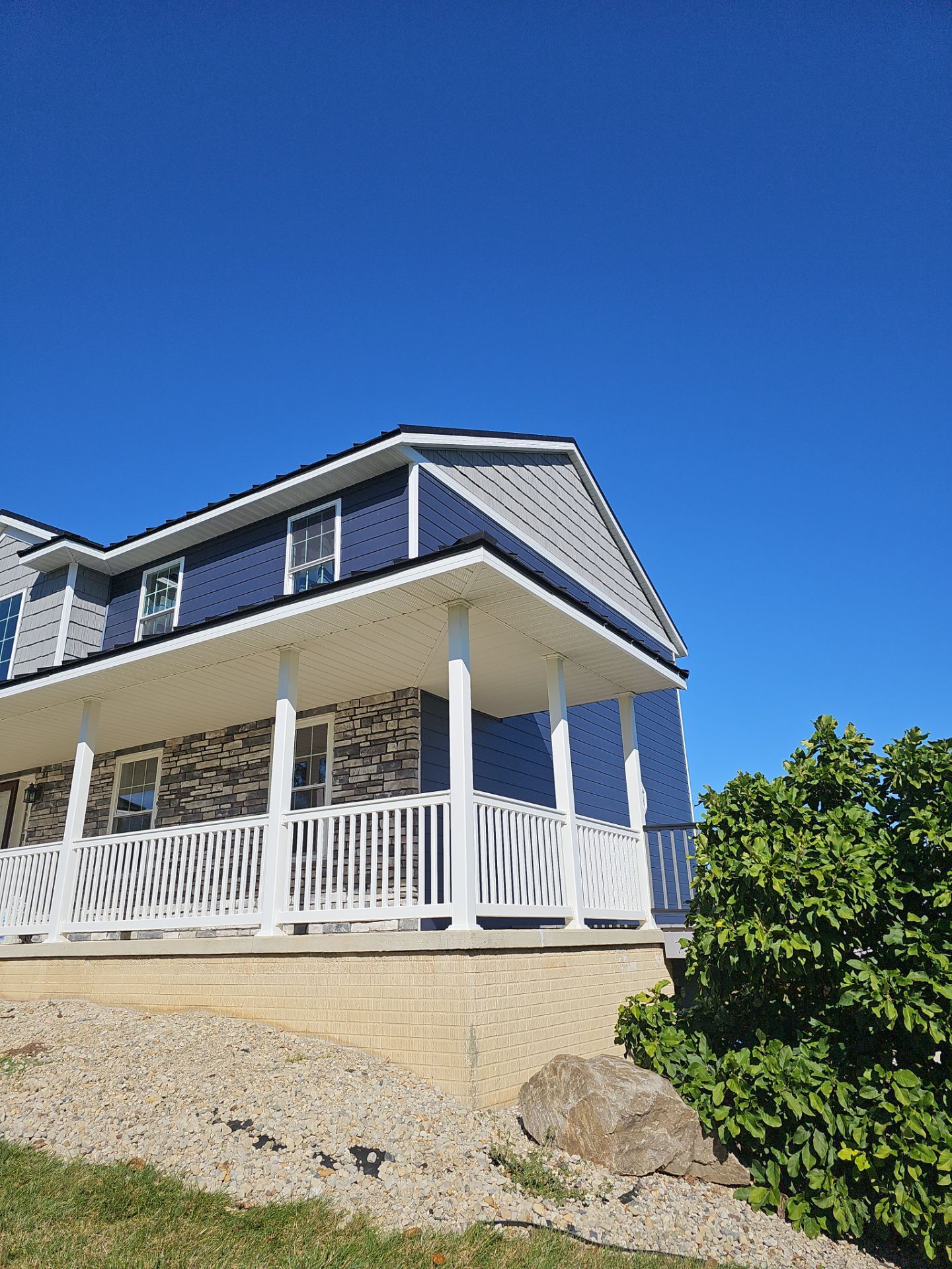 Jackson Center -Roof/Siding Replacement by Nitro Roofing and Construction