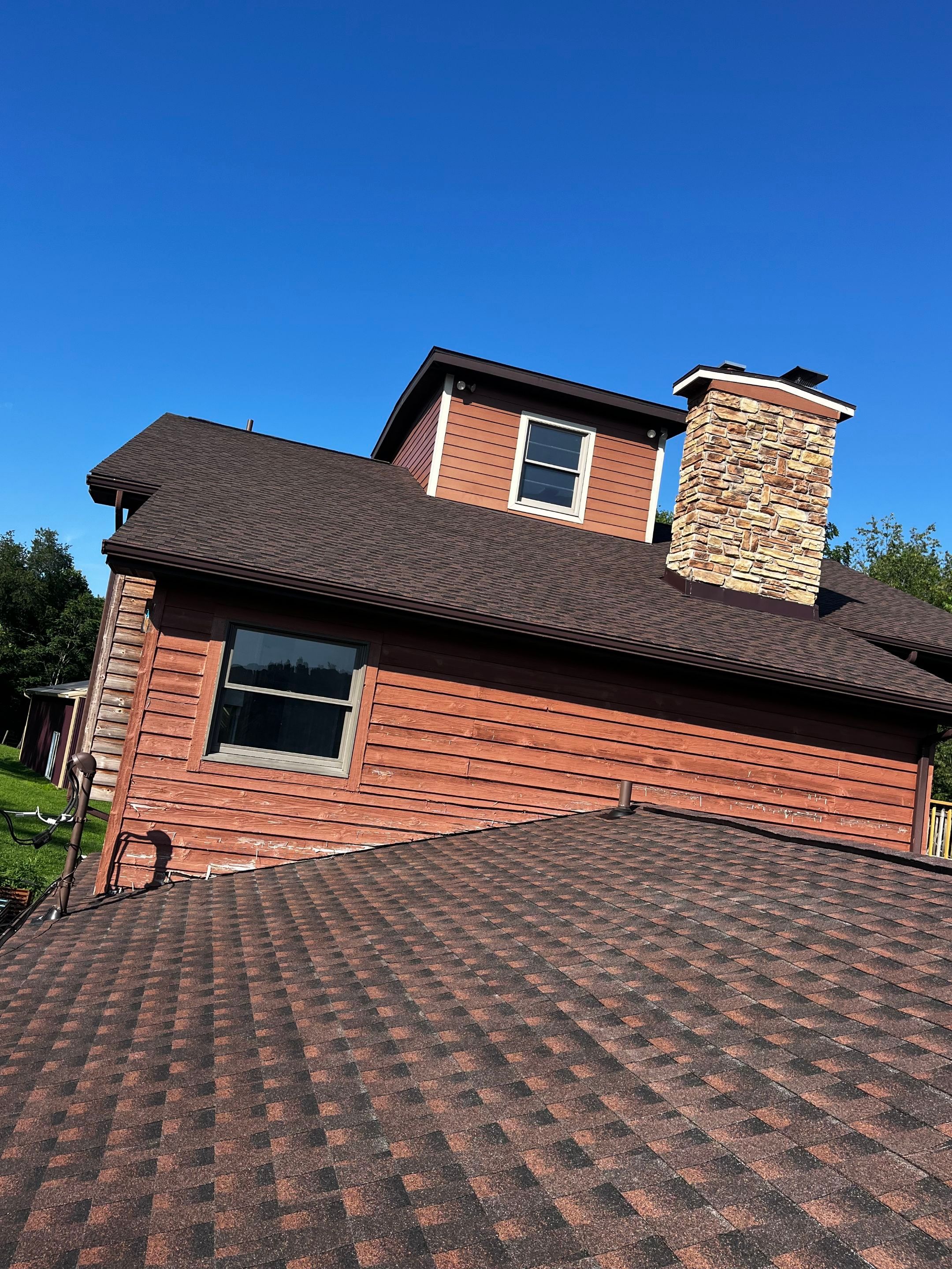 Residential Roofing Installation using GAF TImberline HDZ Hickory by Rainstoppers Roofing